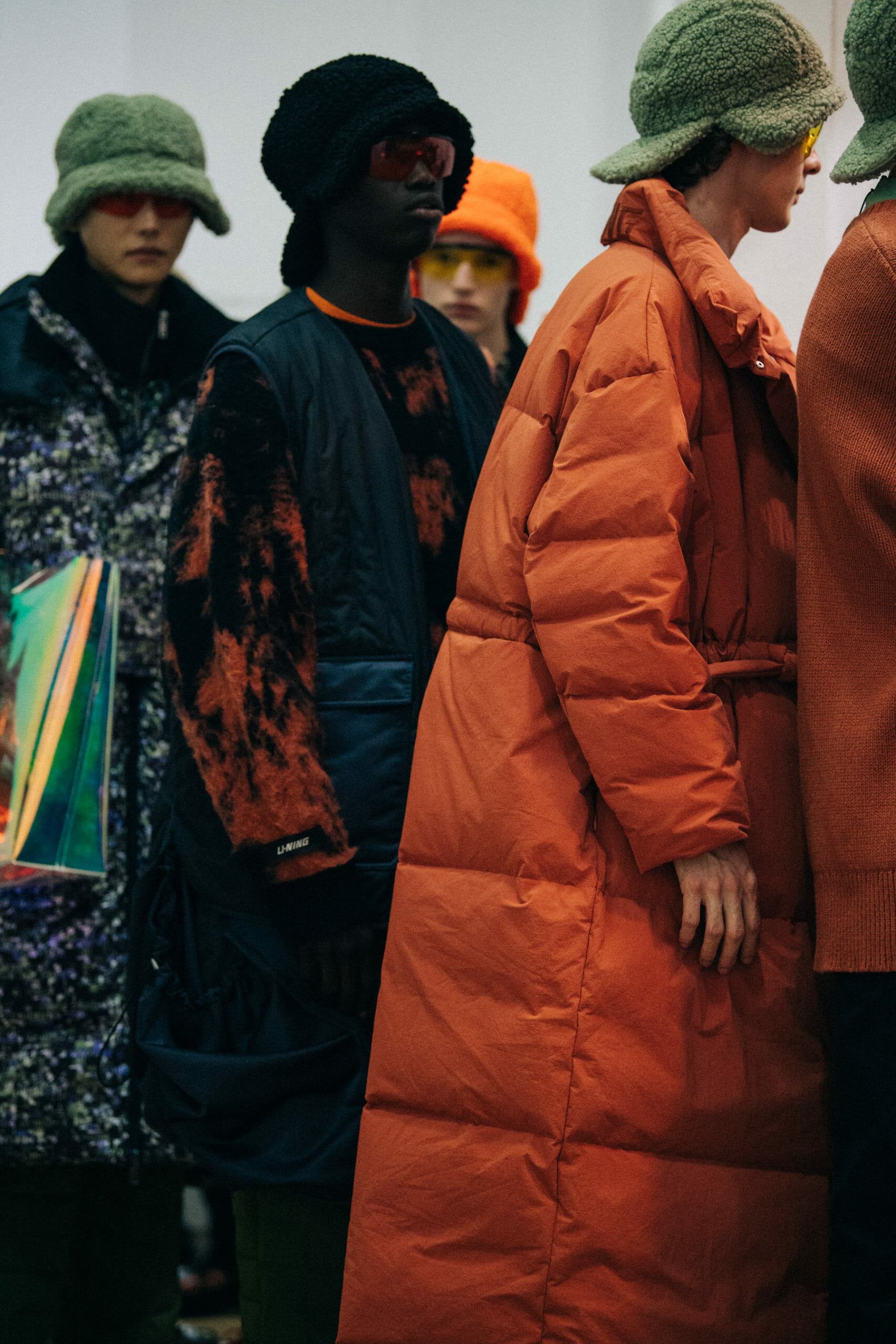Models wearing coloured glasses at Li Ning