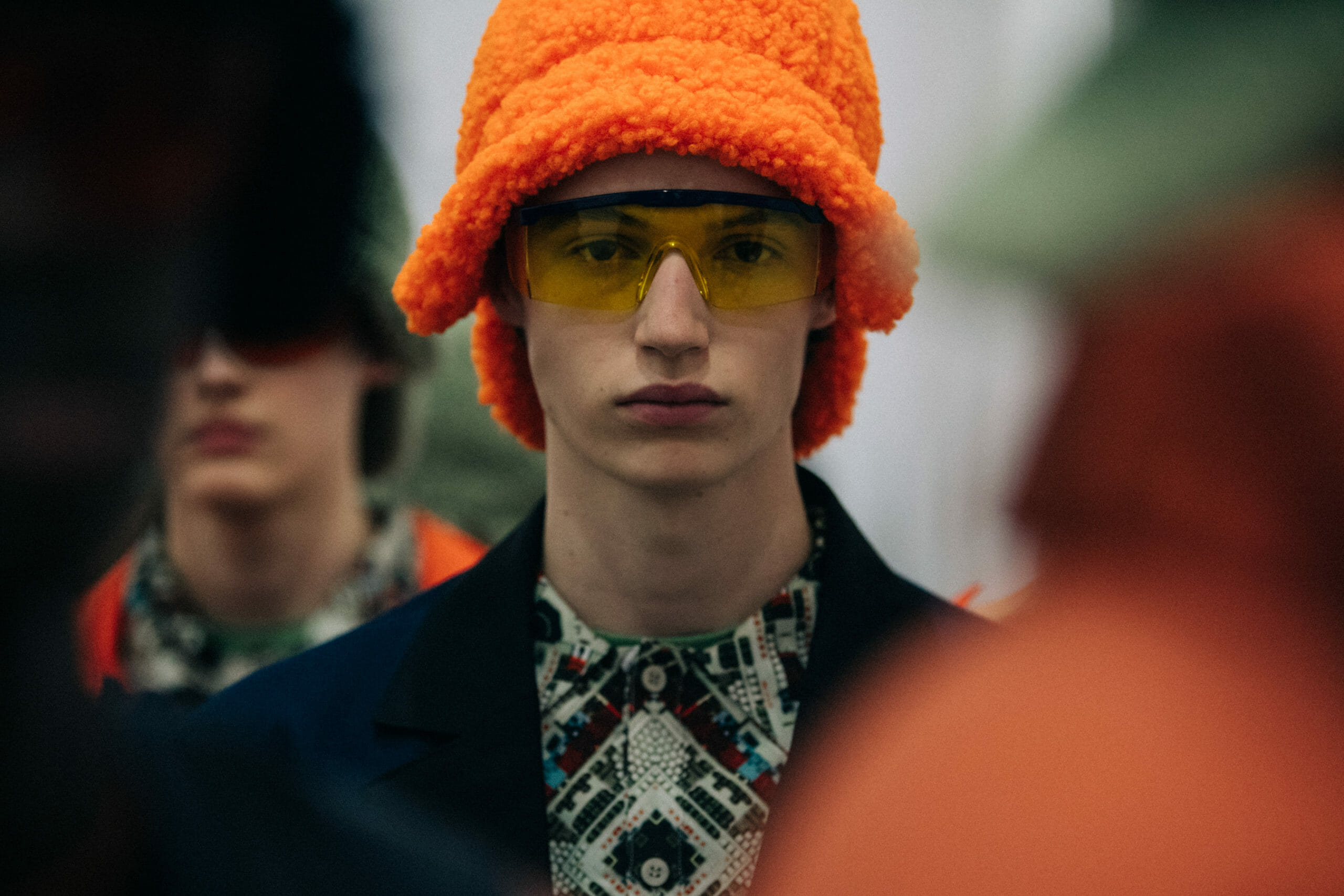 Models wearing coloured glasses at Li Ning