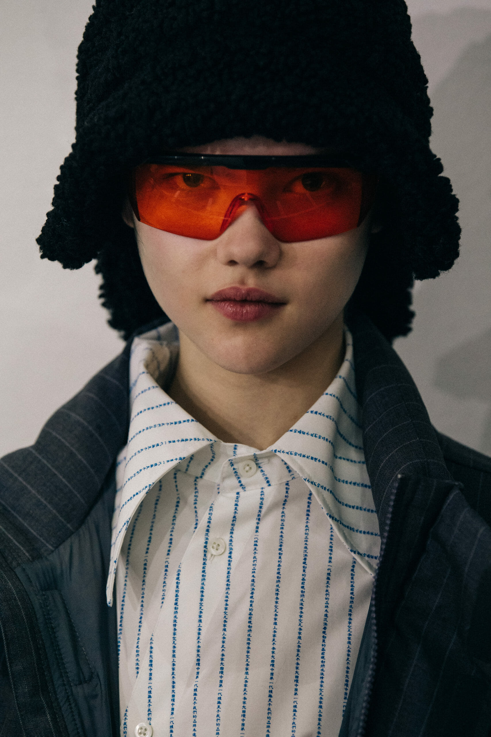 Models wearing coloured glasses at Li Ning