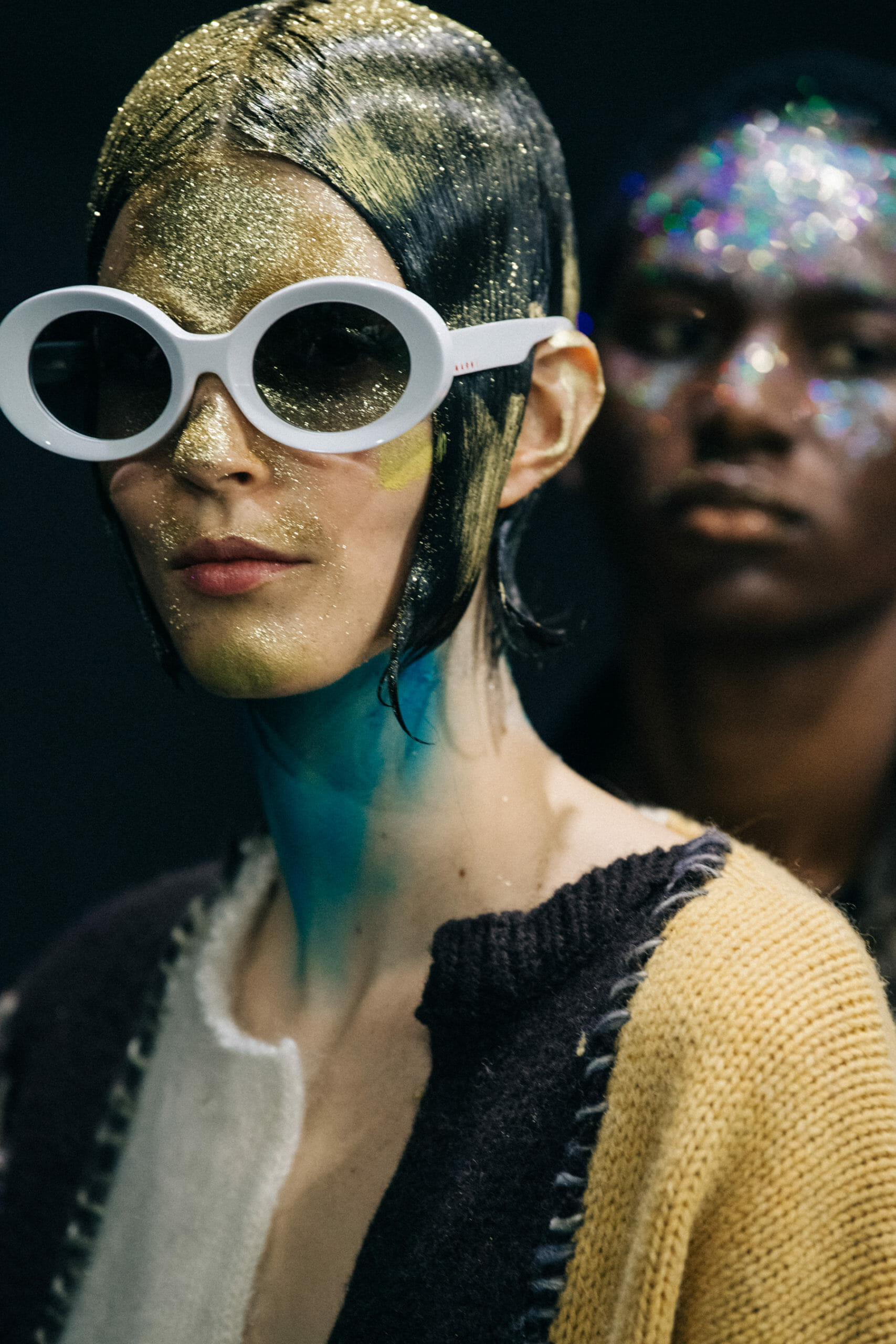 Models wearing glitter at Marni