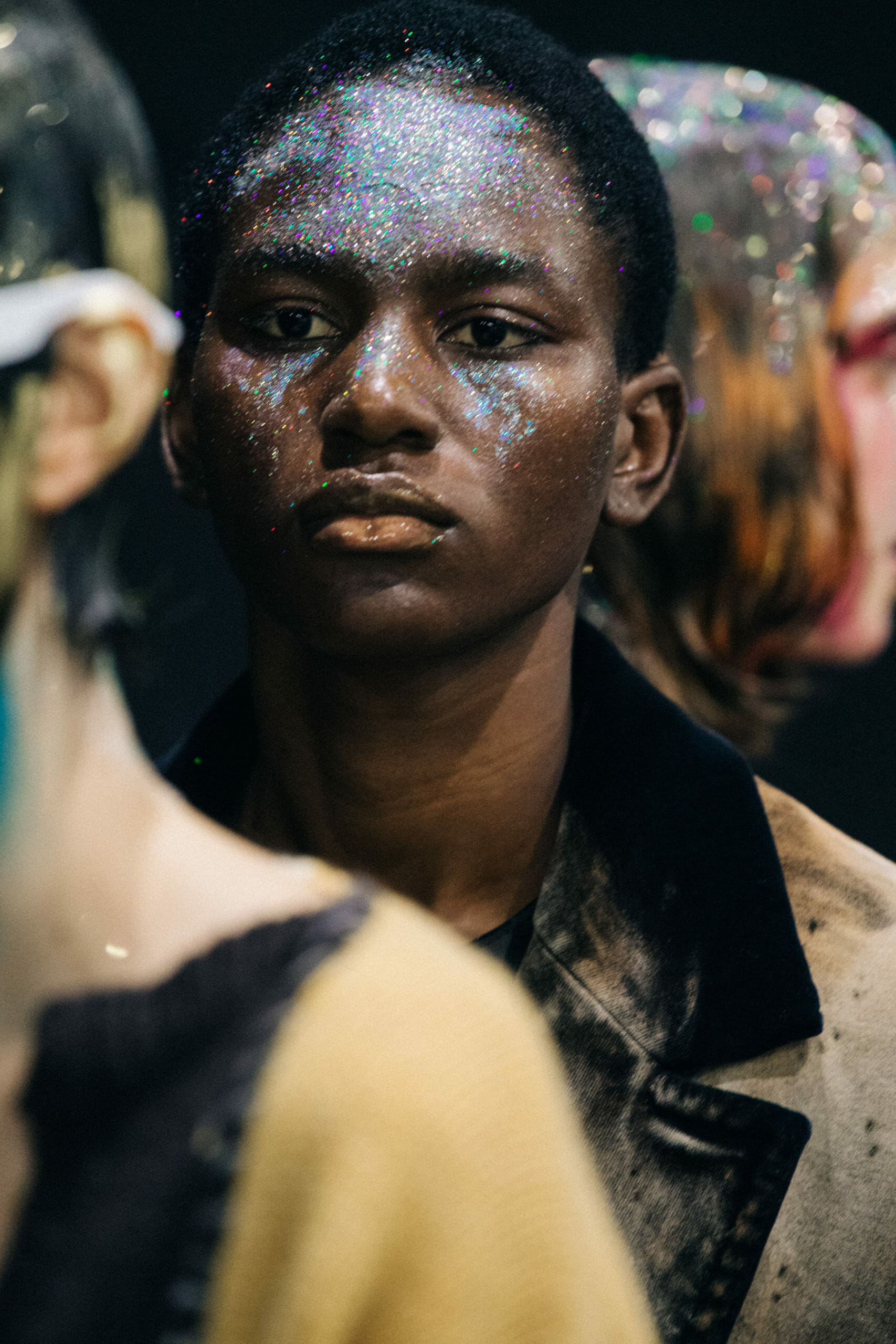 Models wearing glitter at Marni