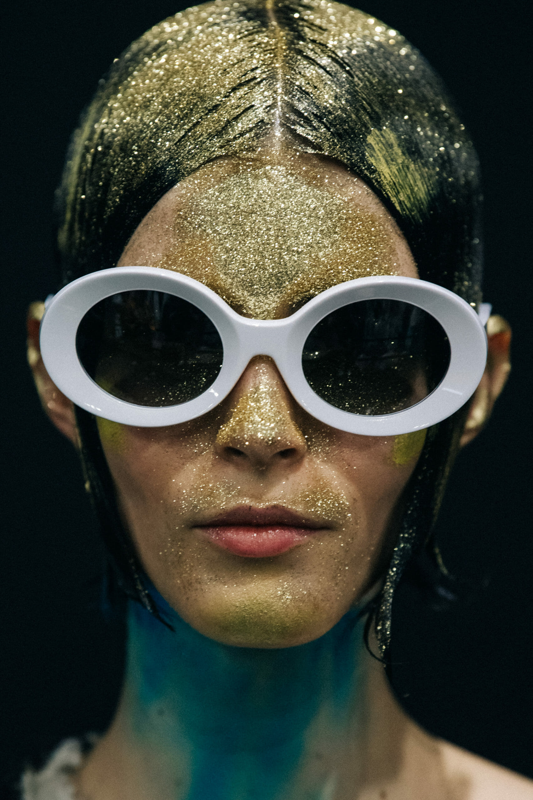 Models wearing glitter at Marni