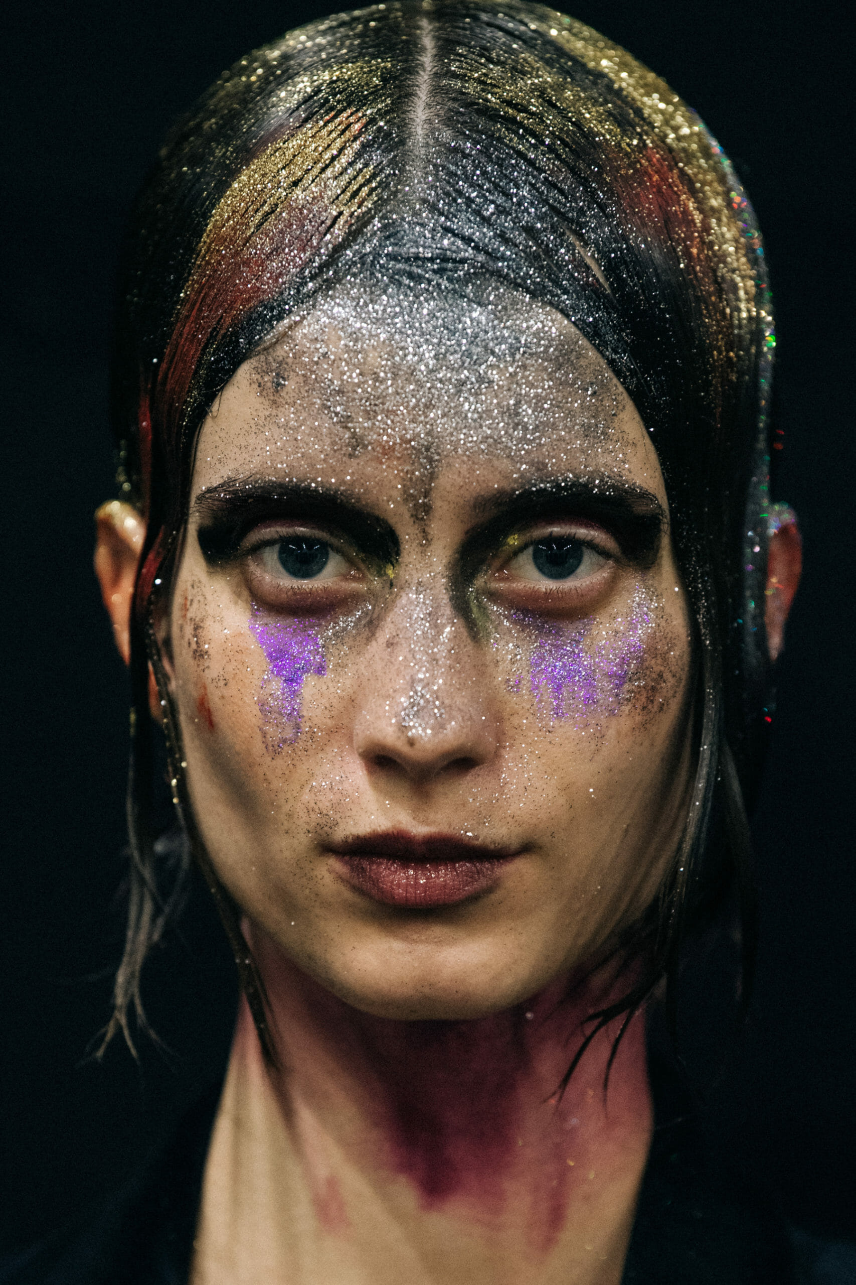 Models wearing glitter at Marni