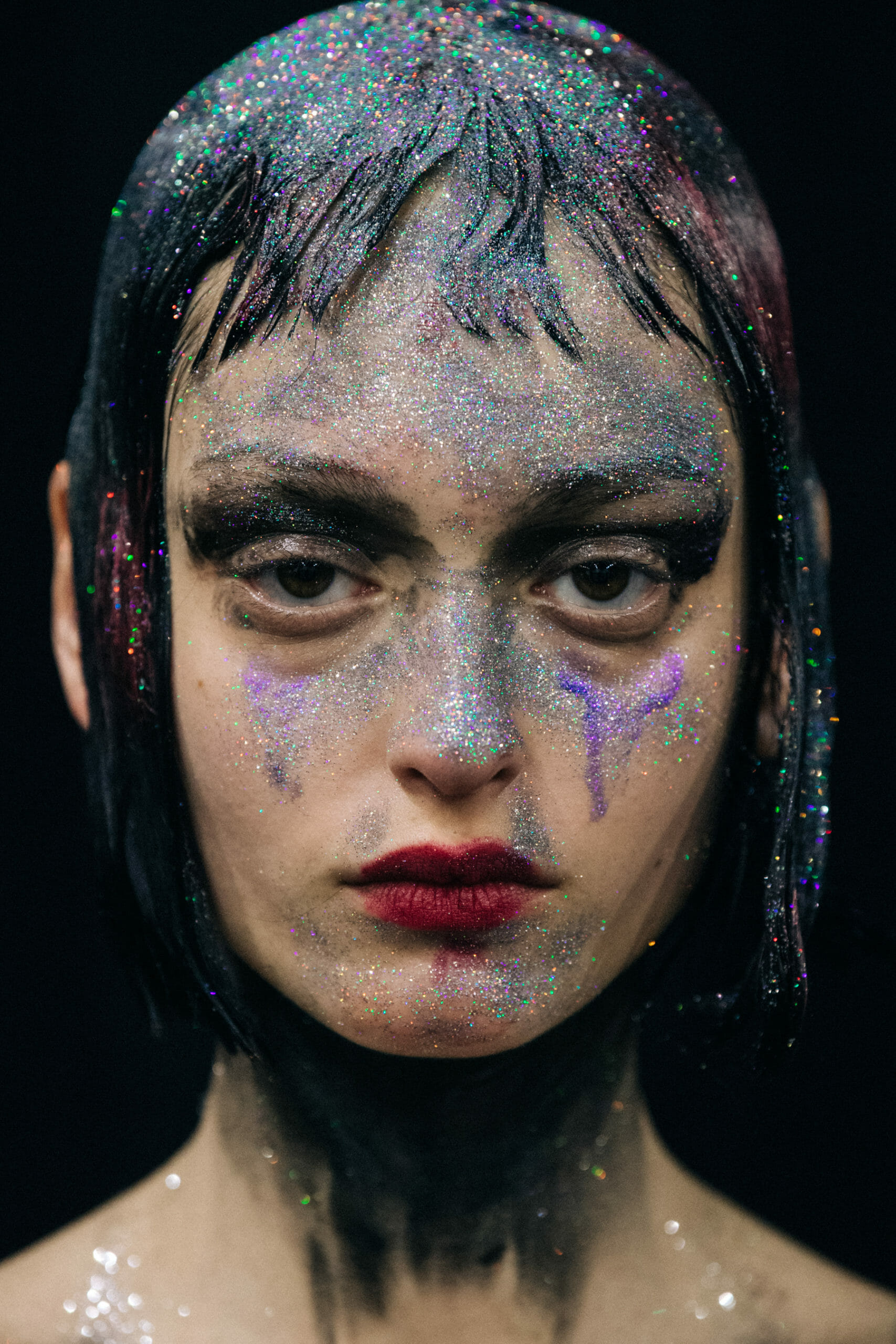 Models wearing glitter at Marni