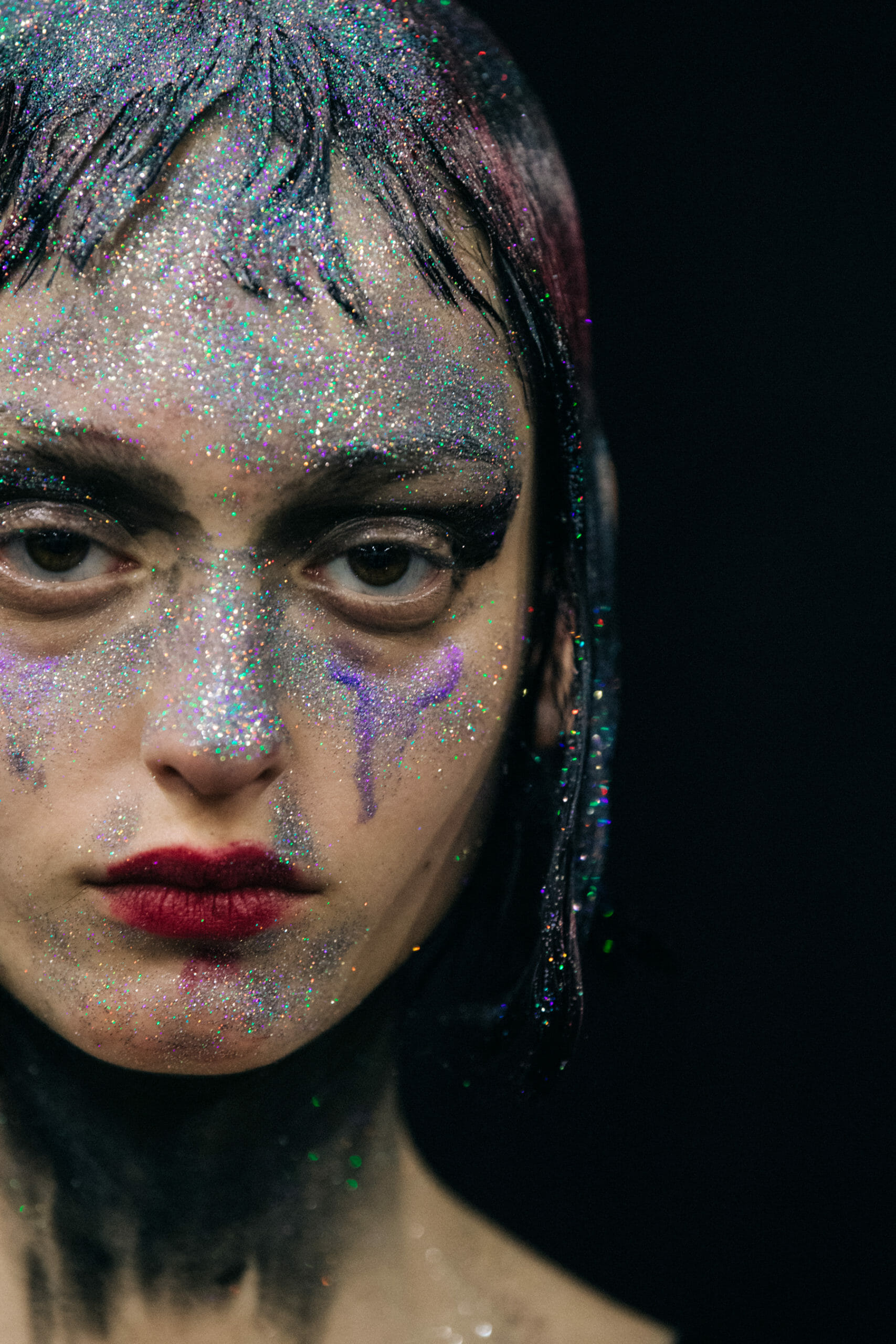 Models wearing glitter at Marni