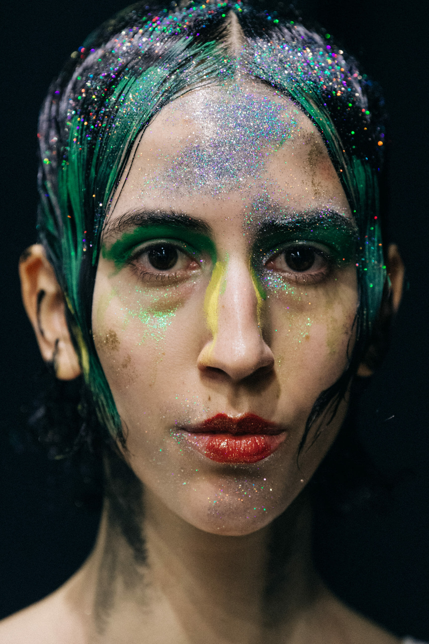 Models wearing glitter at Marni