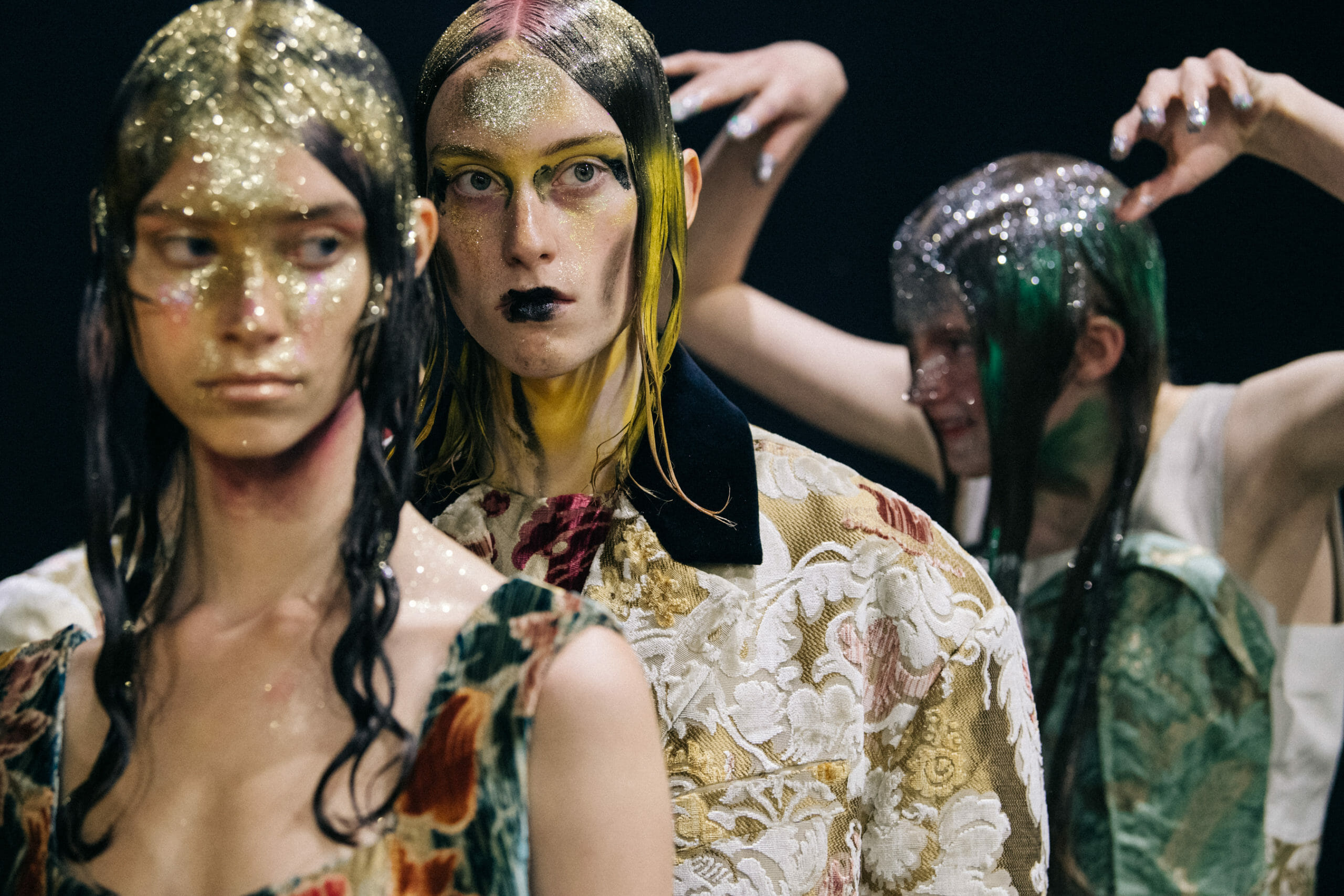 Models wearing glitter at Marni