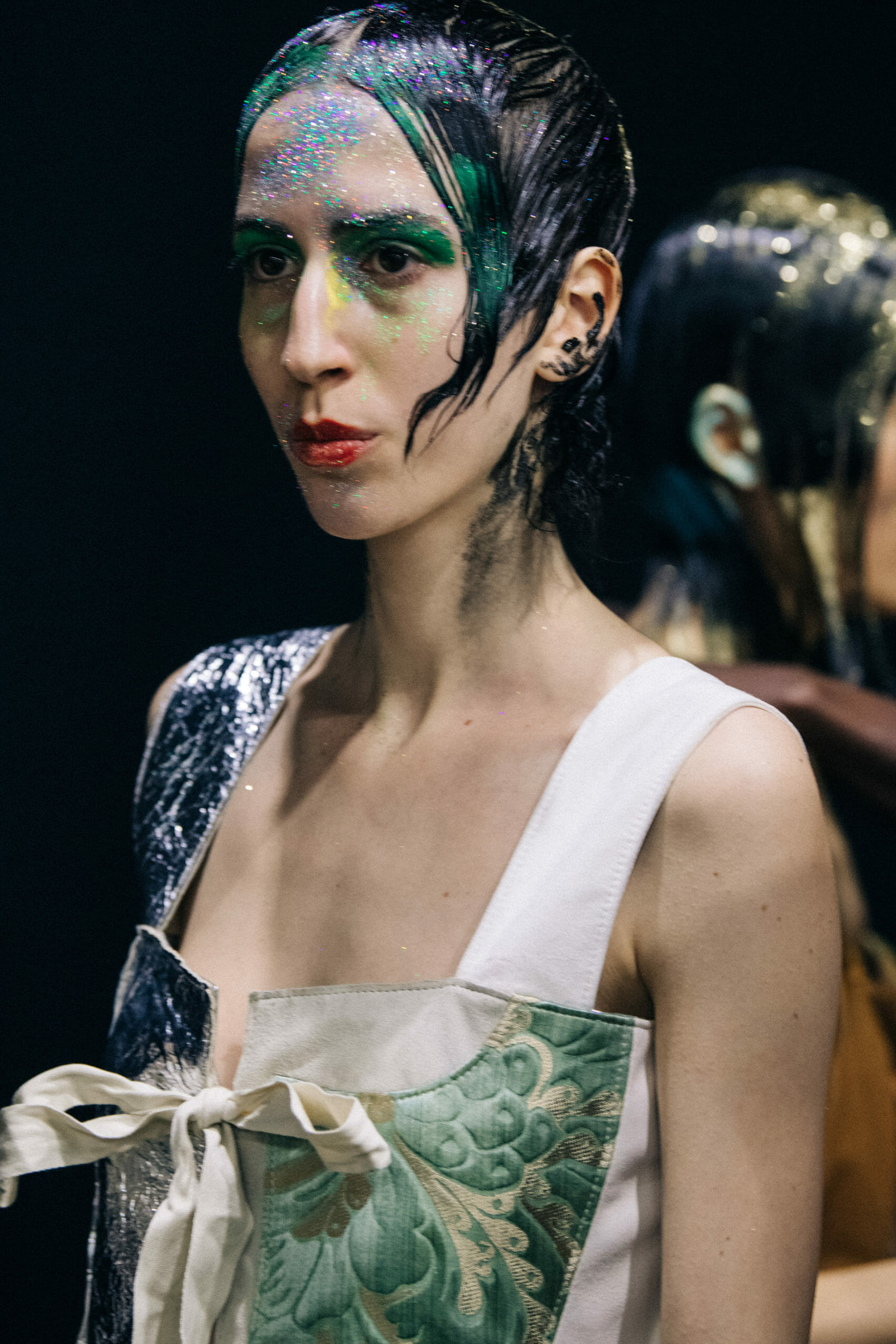 Models wearing glitter at Marni