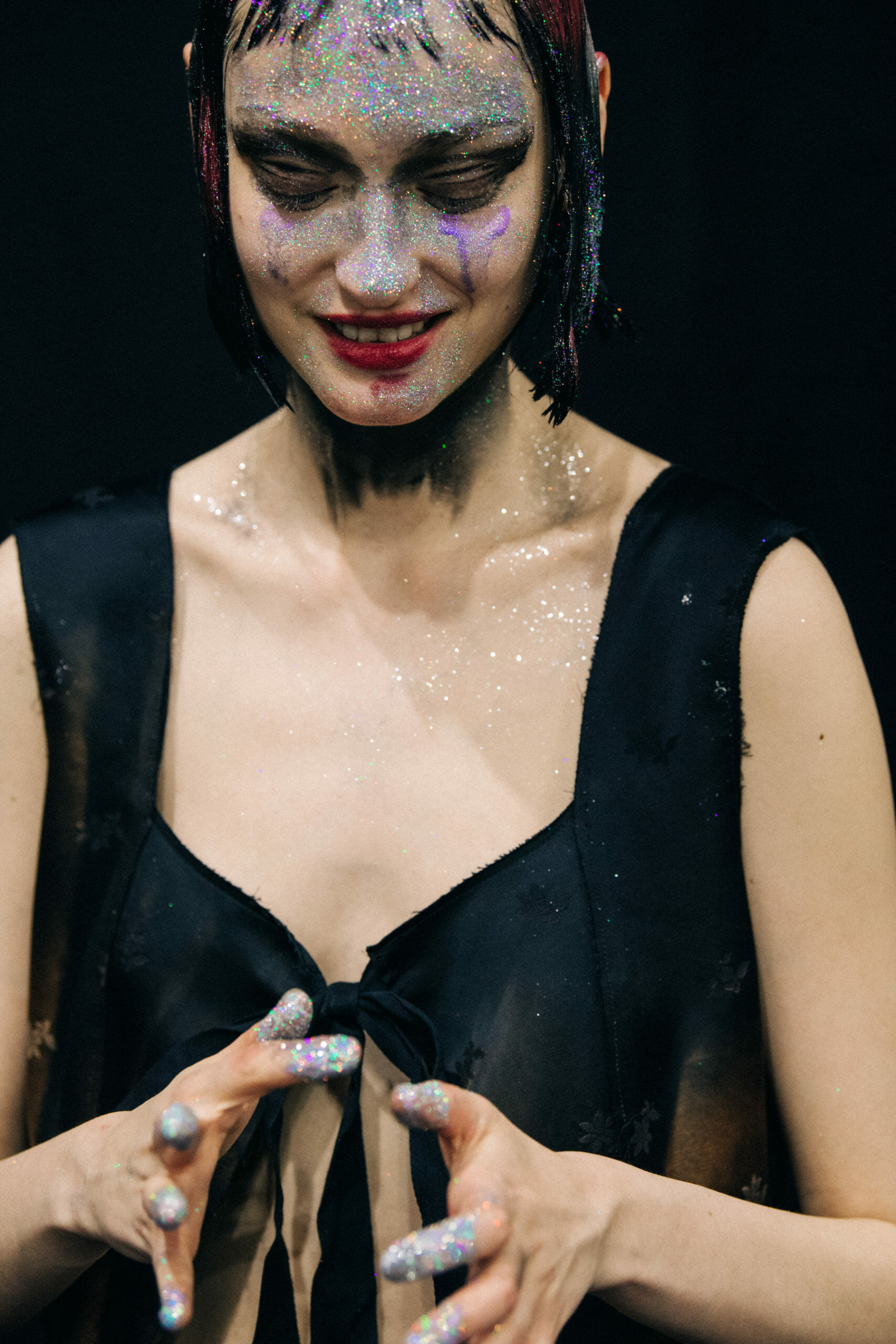 Models wearing glitter at Marni