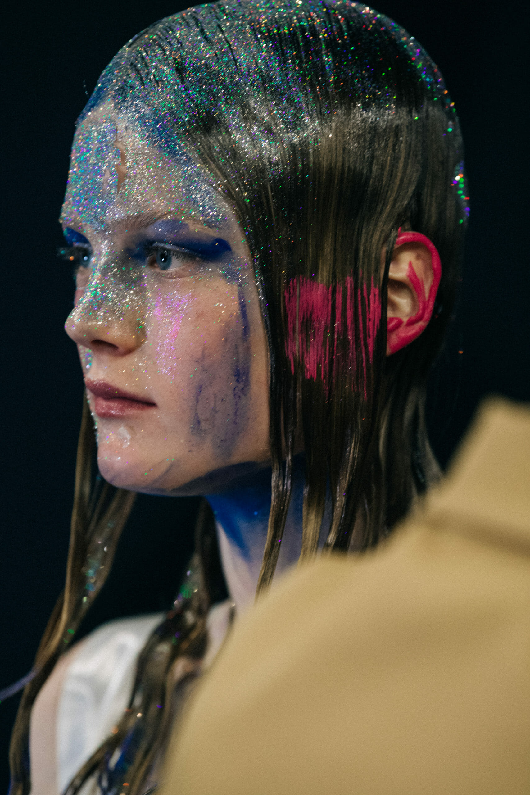 Models wearing glitter at Marni