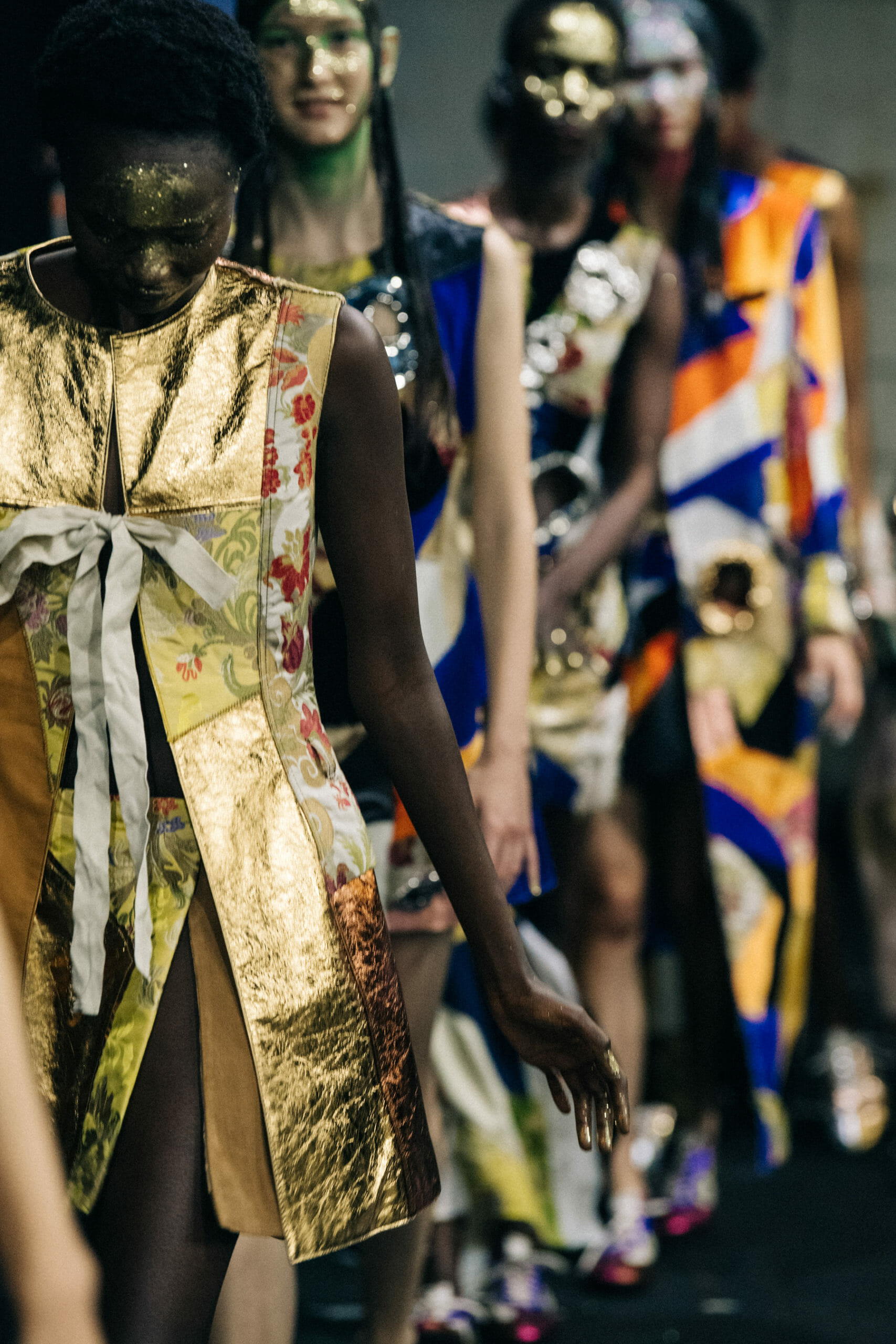 Models wearing glitter at Marni