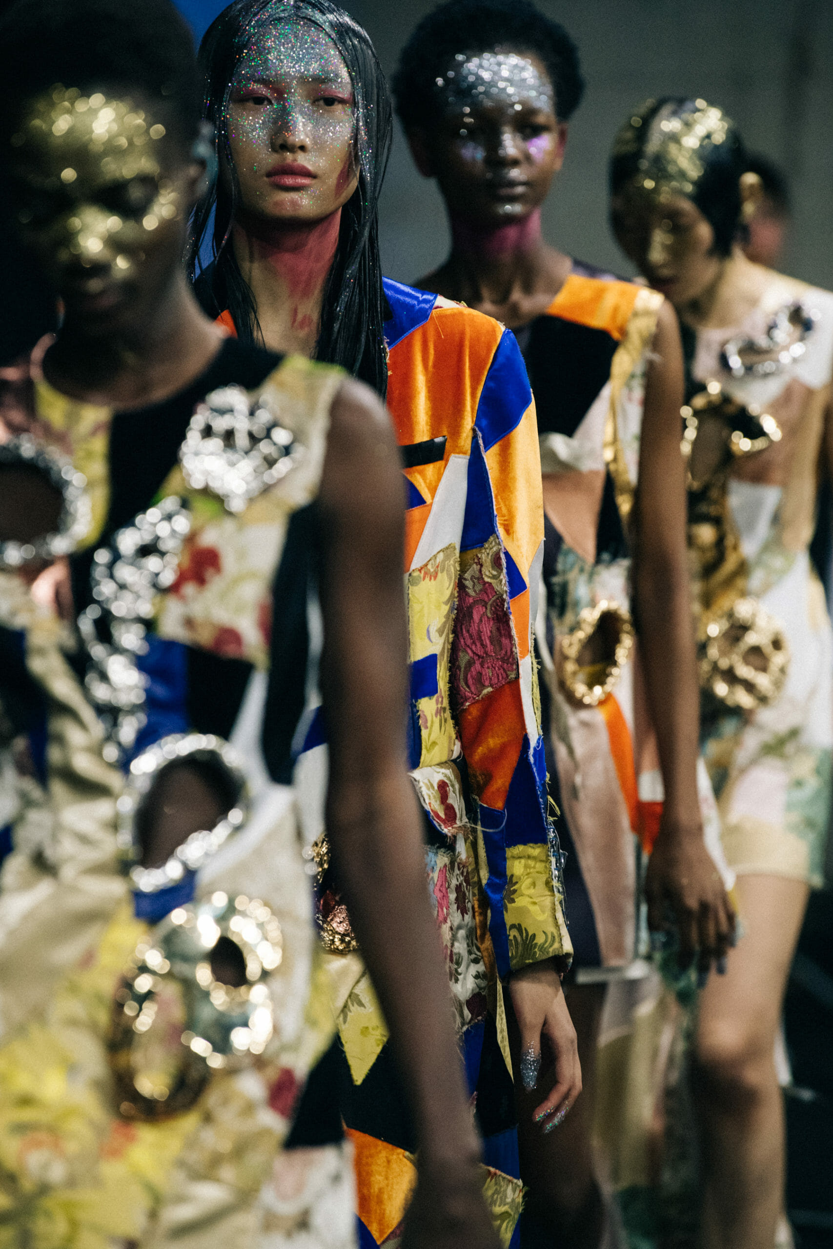 Models wearing glitter at Marni