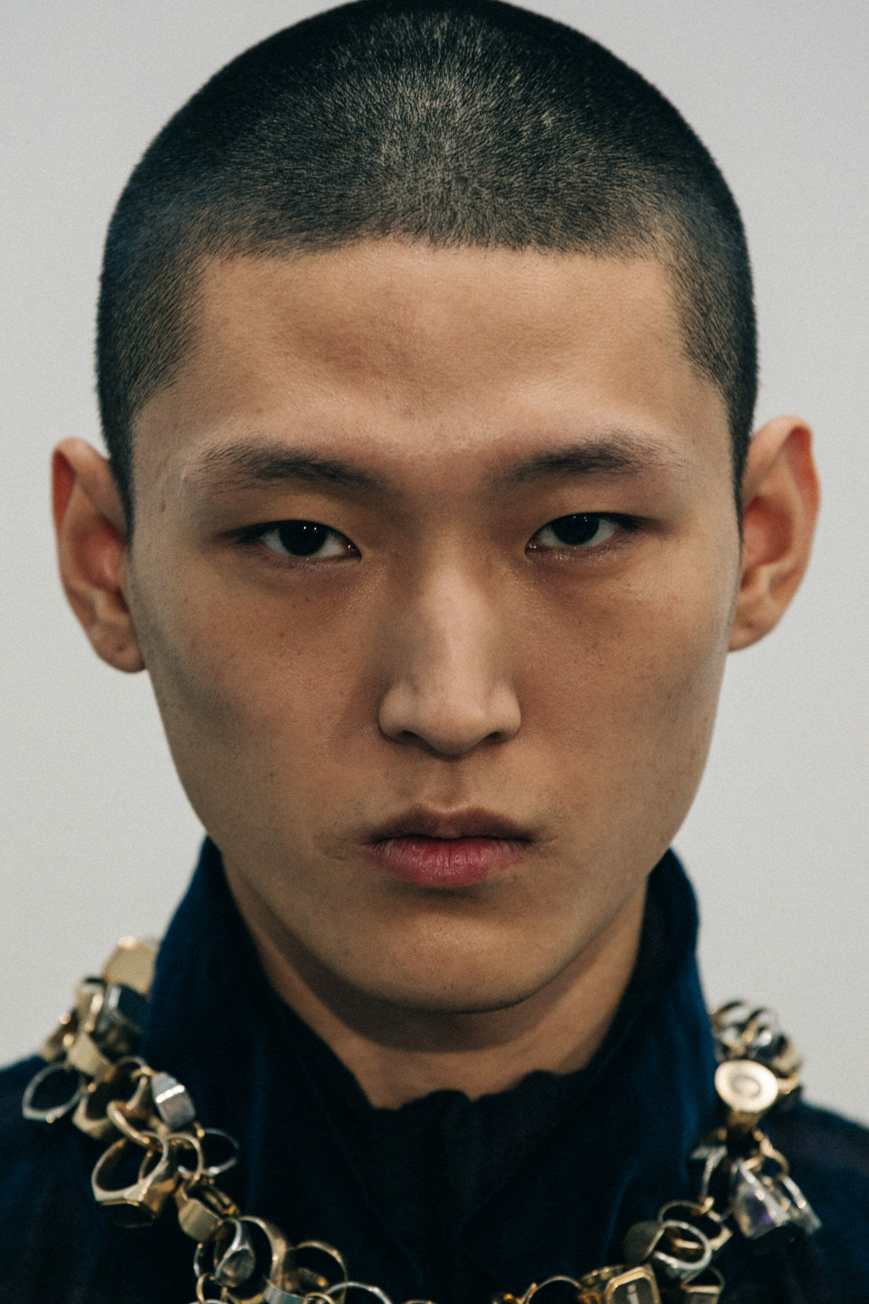 Model wearing green at Sacai