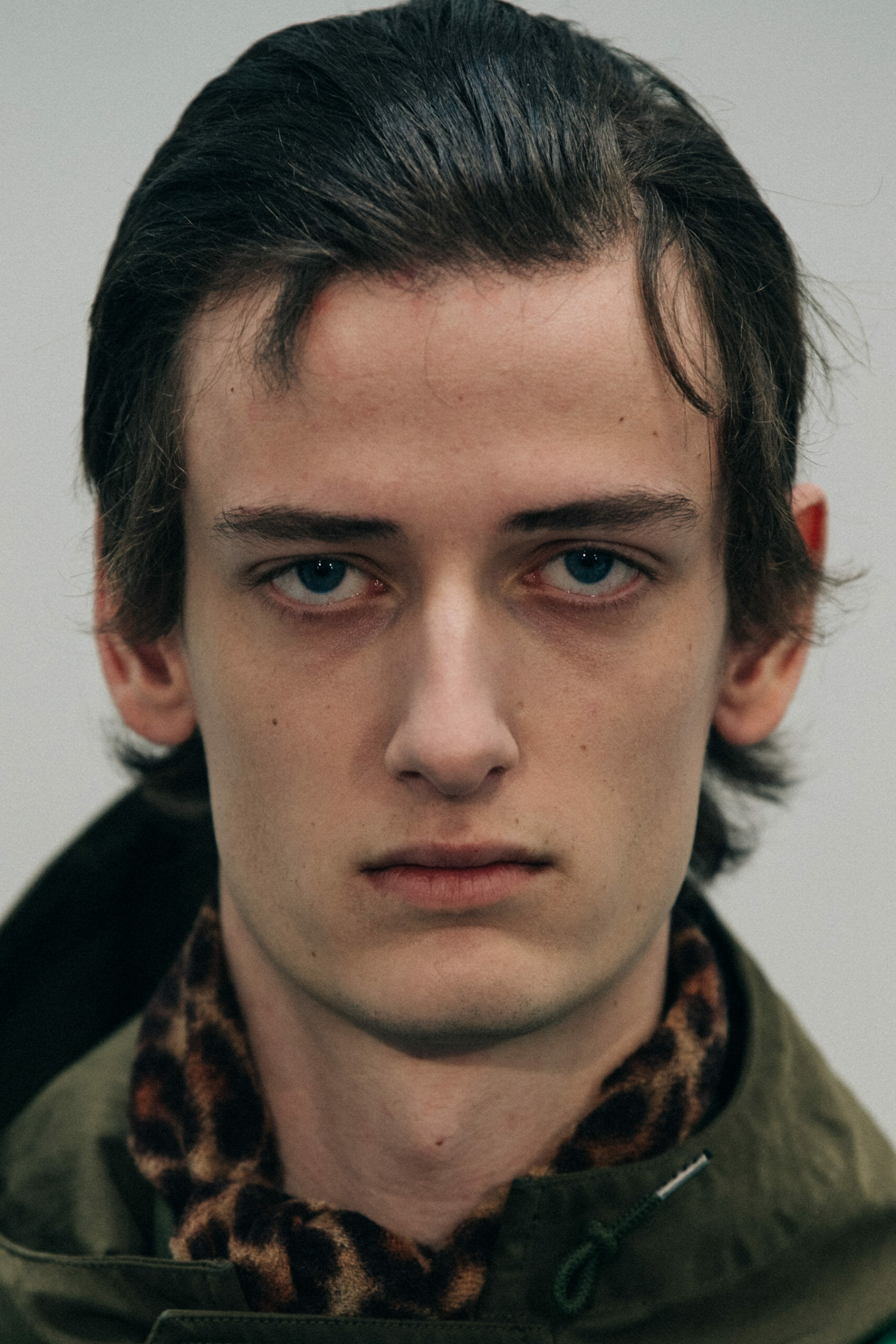 Model wearing green at Sacai
