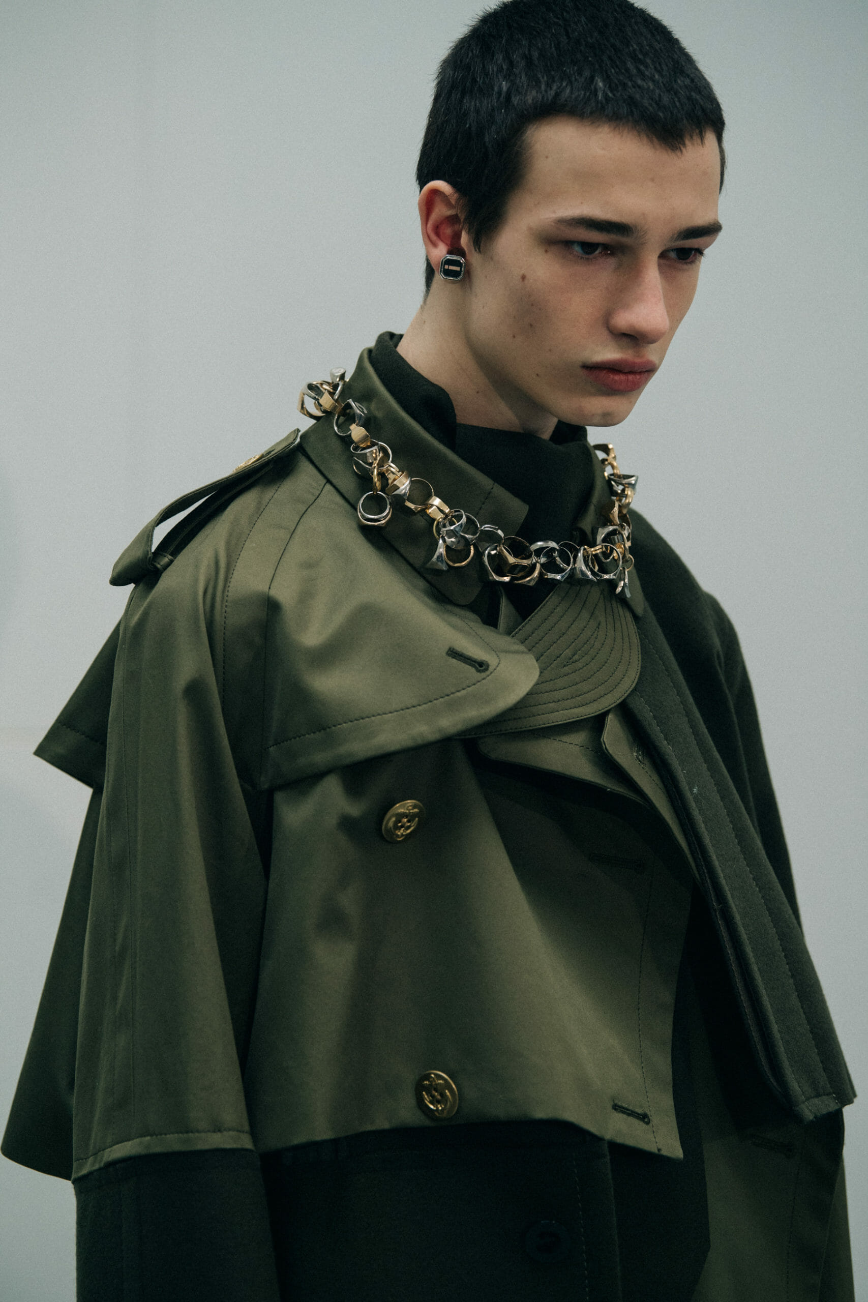 Model wearing green at Sacai