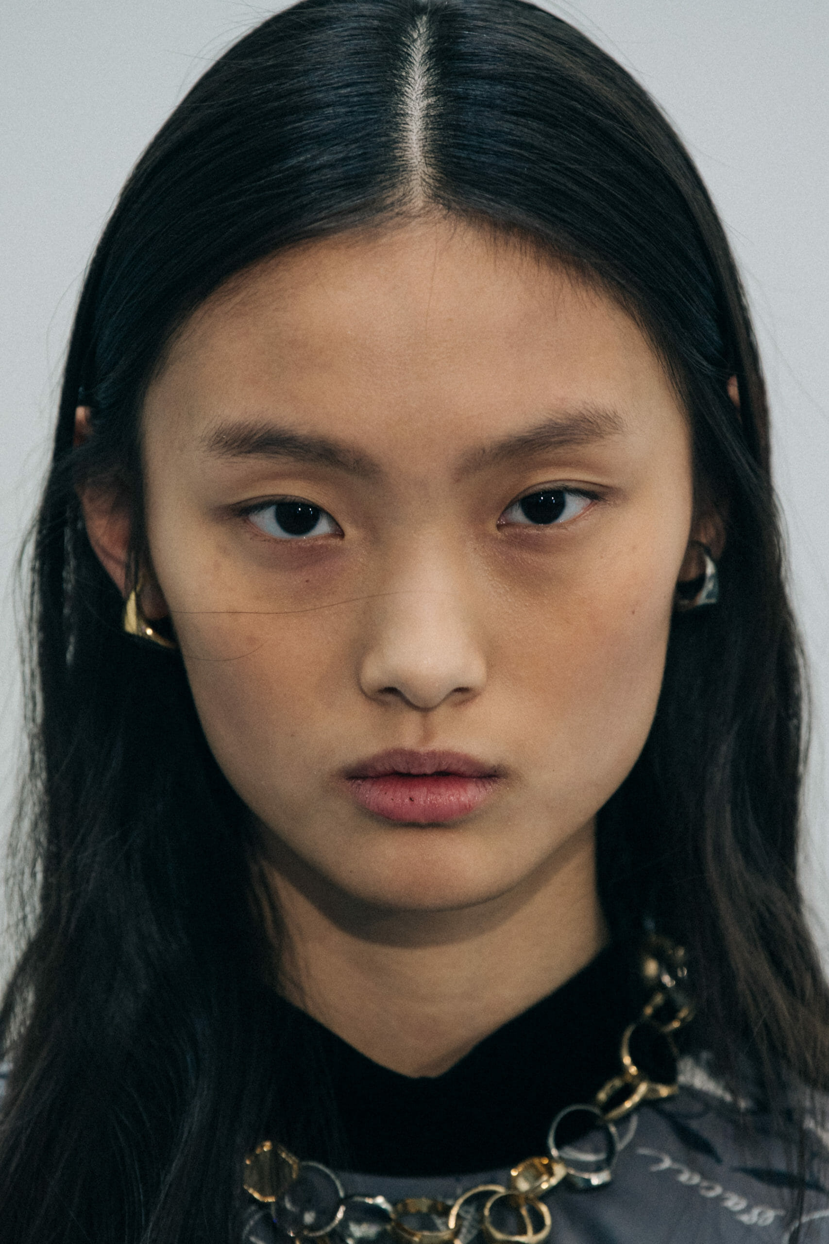 Models wearing Sacai chains