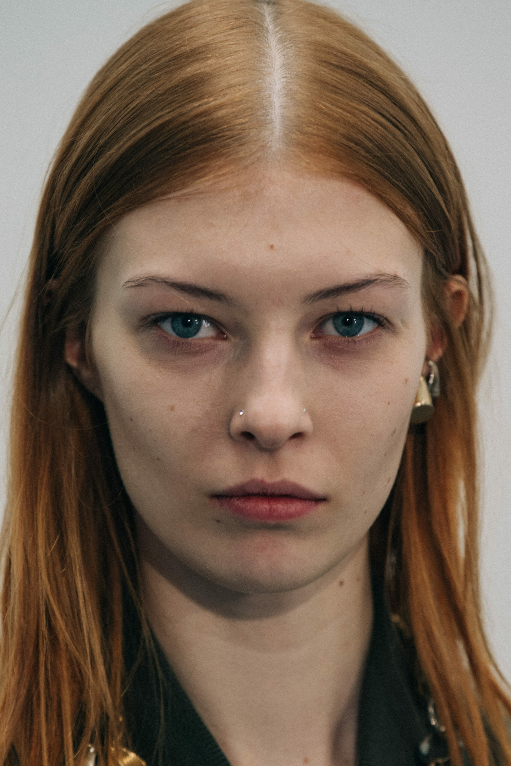 Model wearing green at Sacai