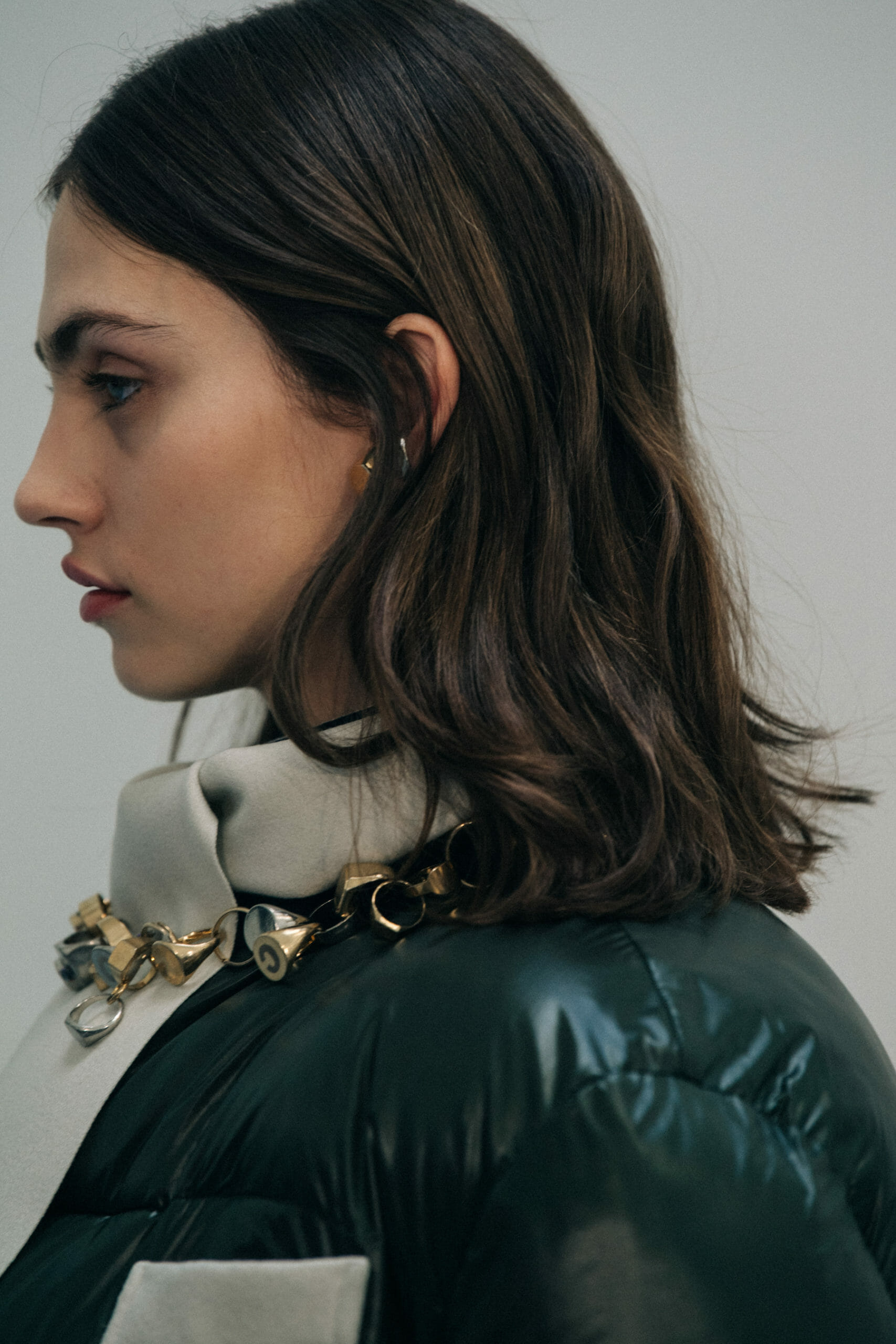 Model wearing green at Sacai