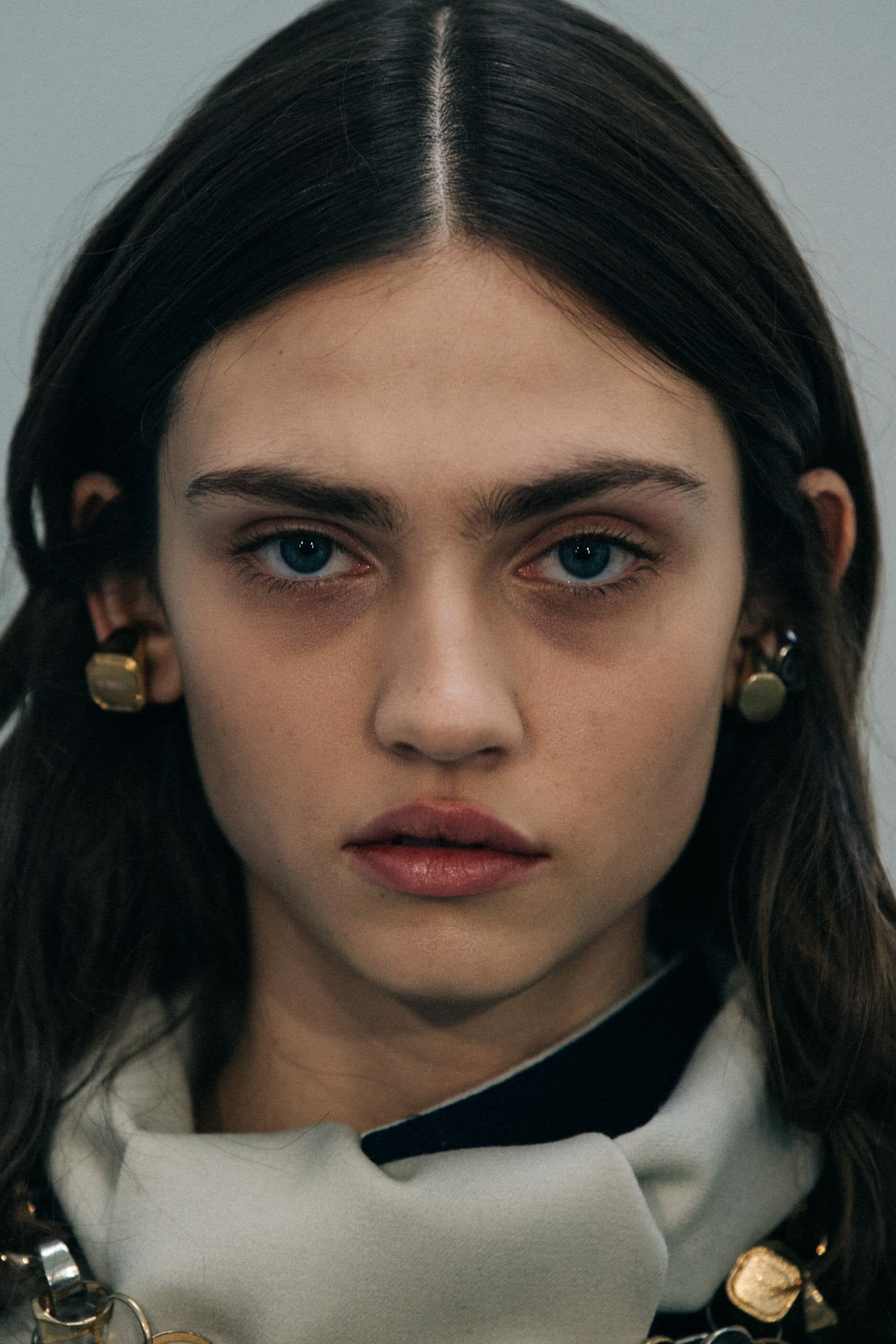 Model wearing green at Sacai