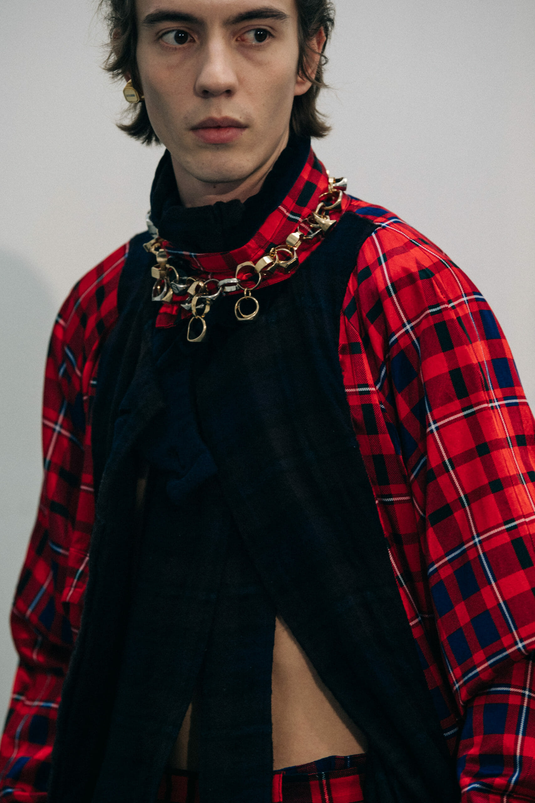 Model wearing red at Sacai