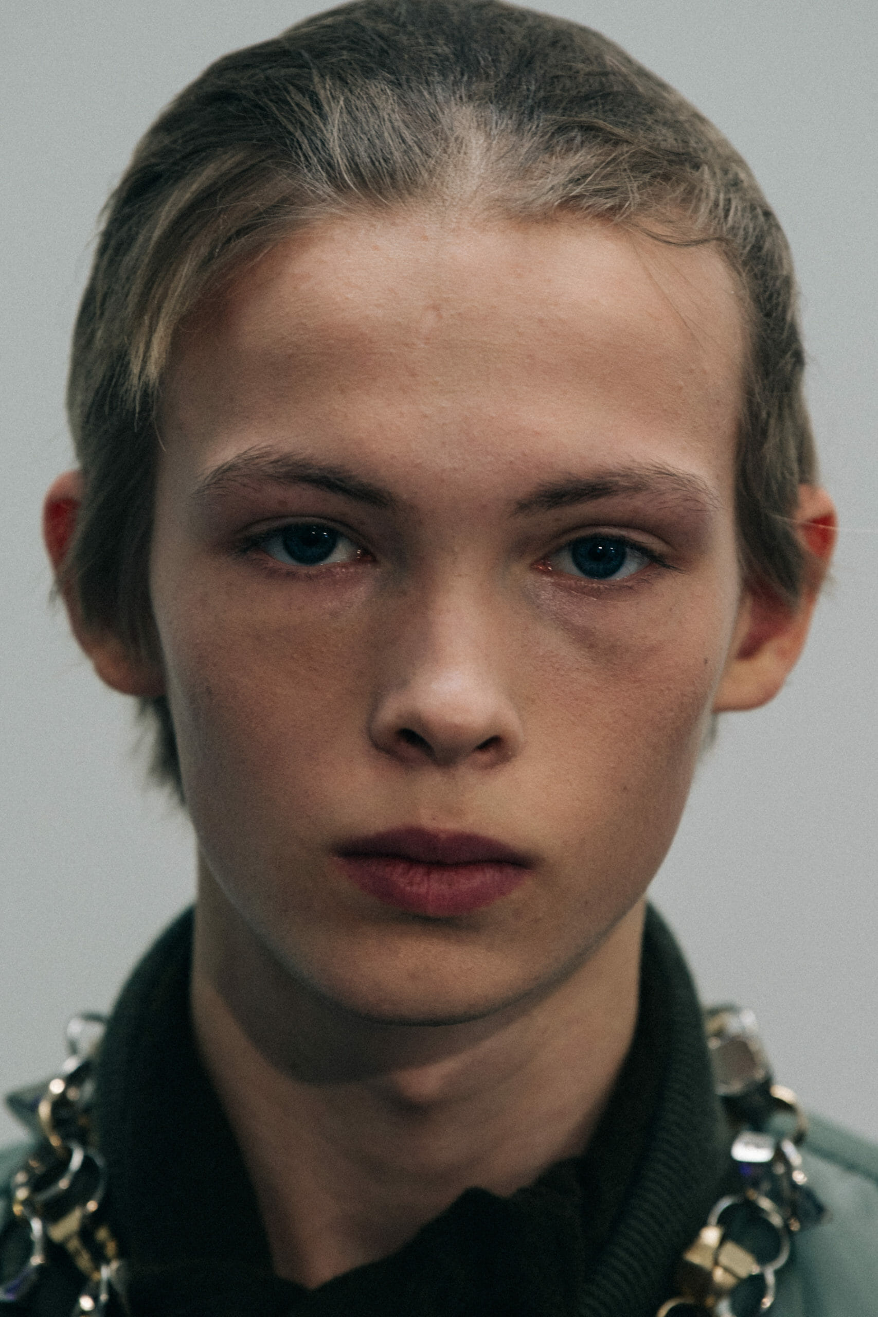 Model wearing green at Sacai
