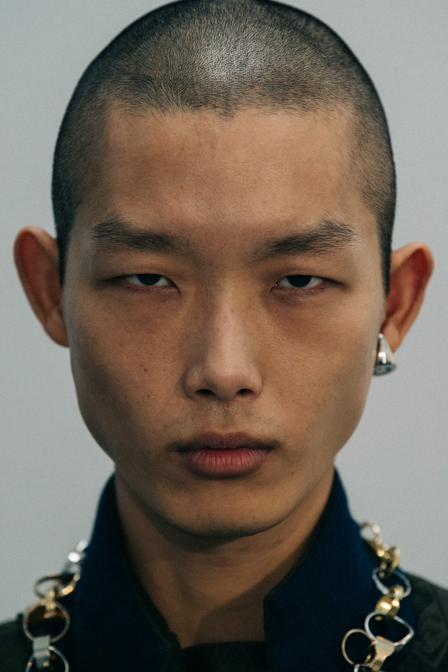 Model wearing green at Sacai