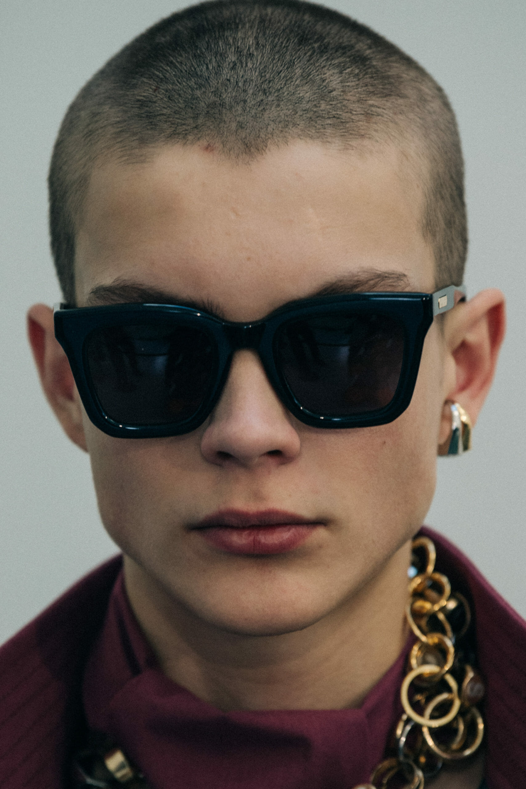 Model wearing red at Sacai