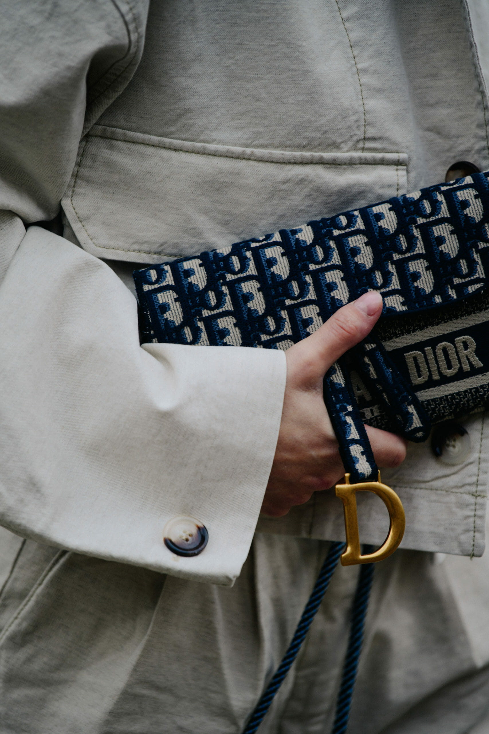 Woman carrying Christian Dior bag