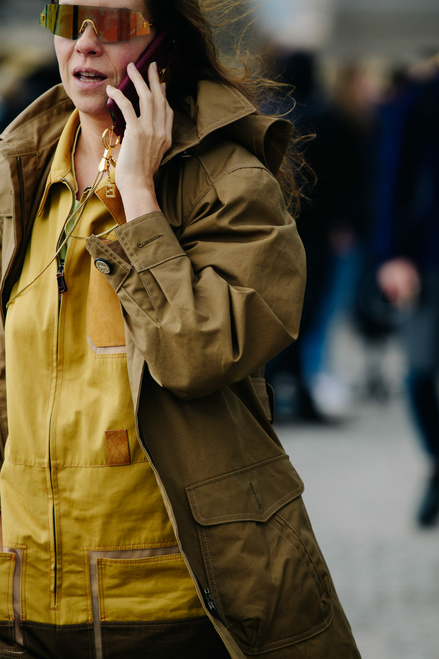 Woman wearing yellow jacket