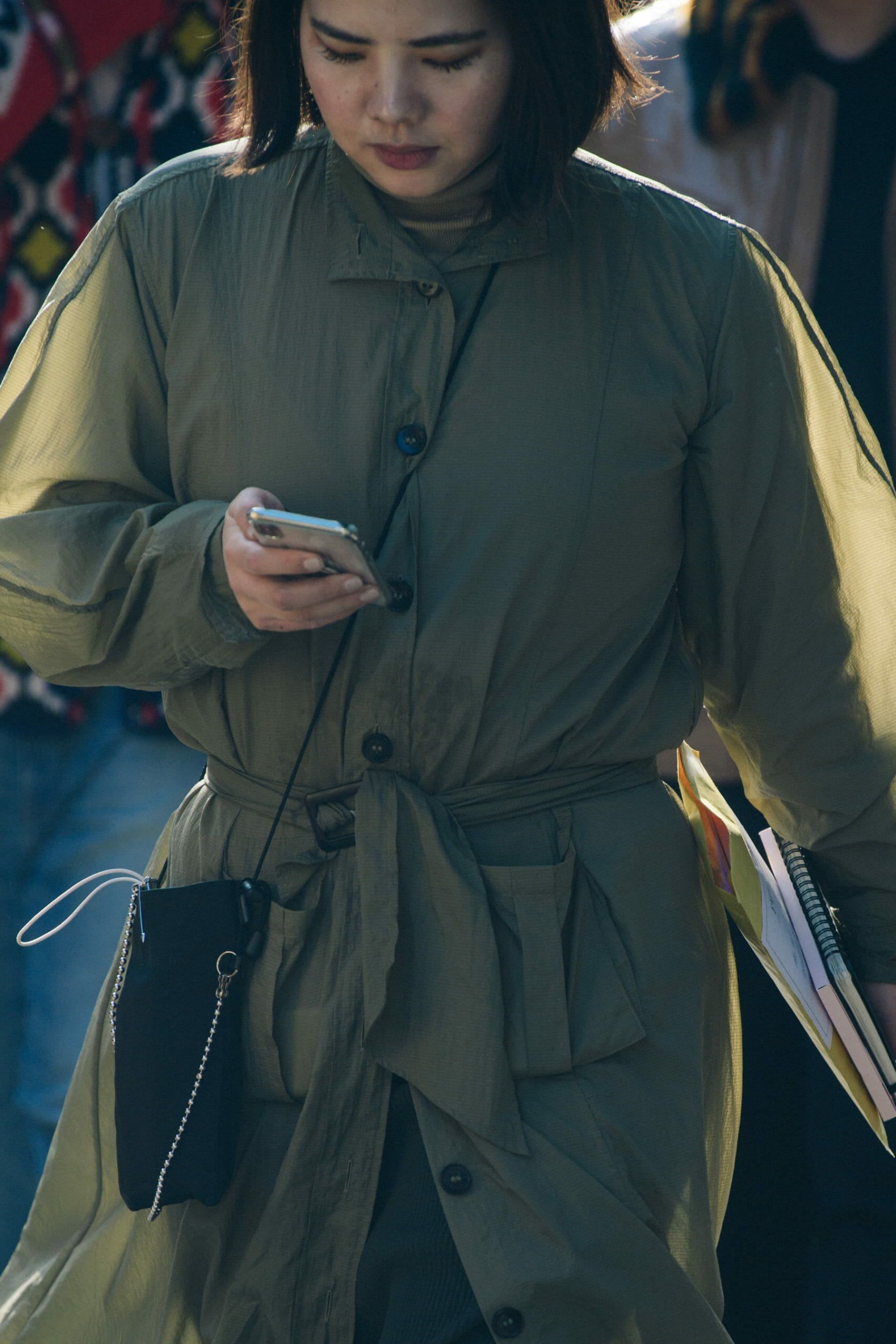 Woman wearing green coat