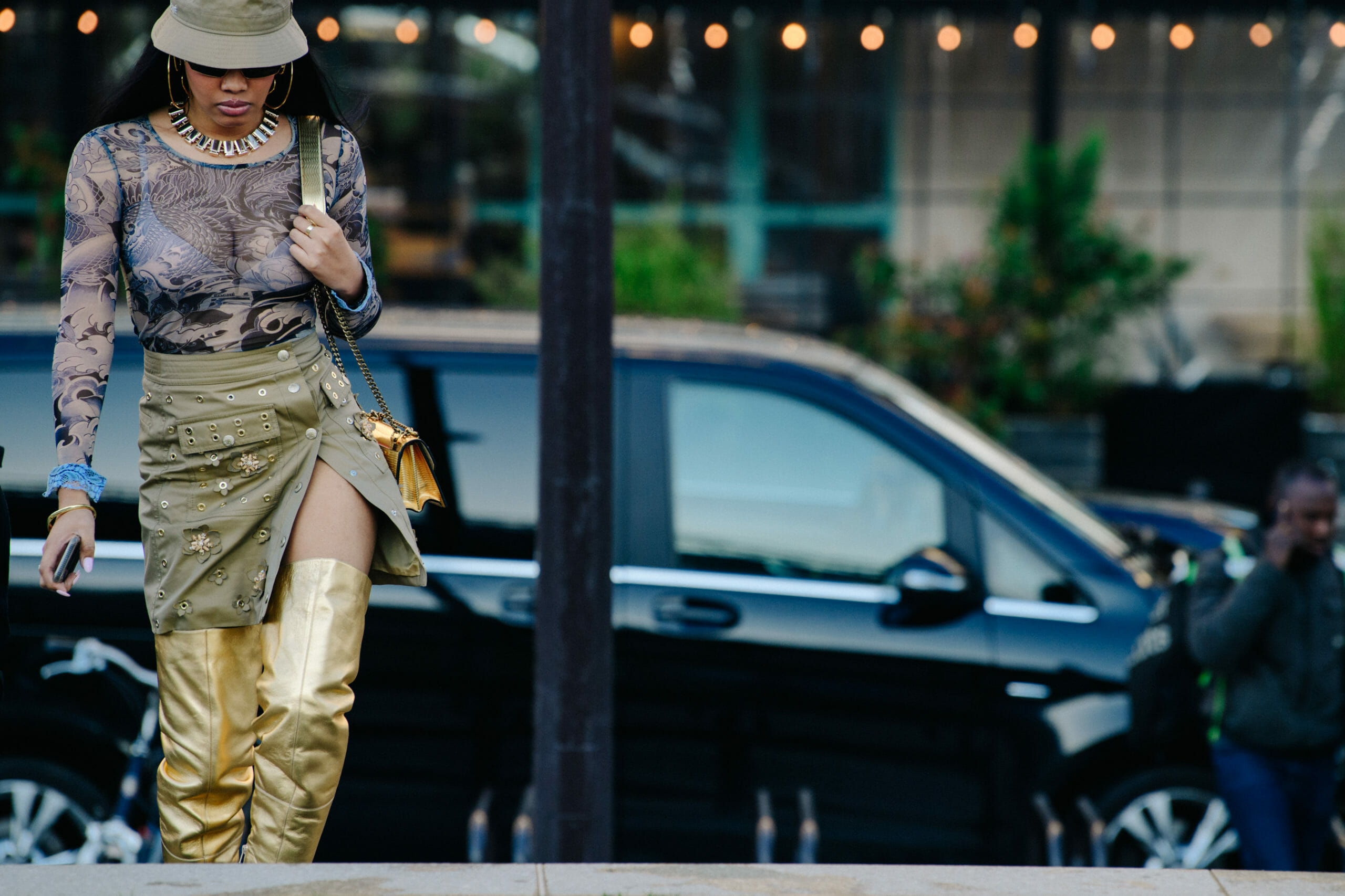 Woman wearing gold boots