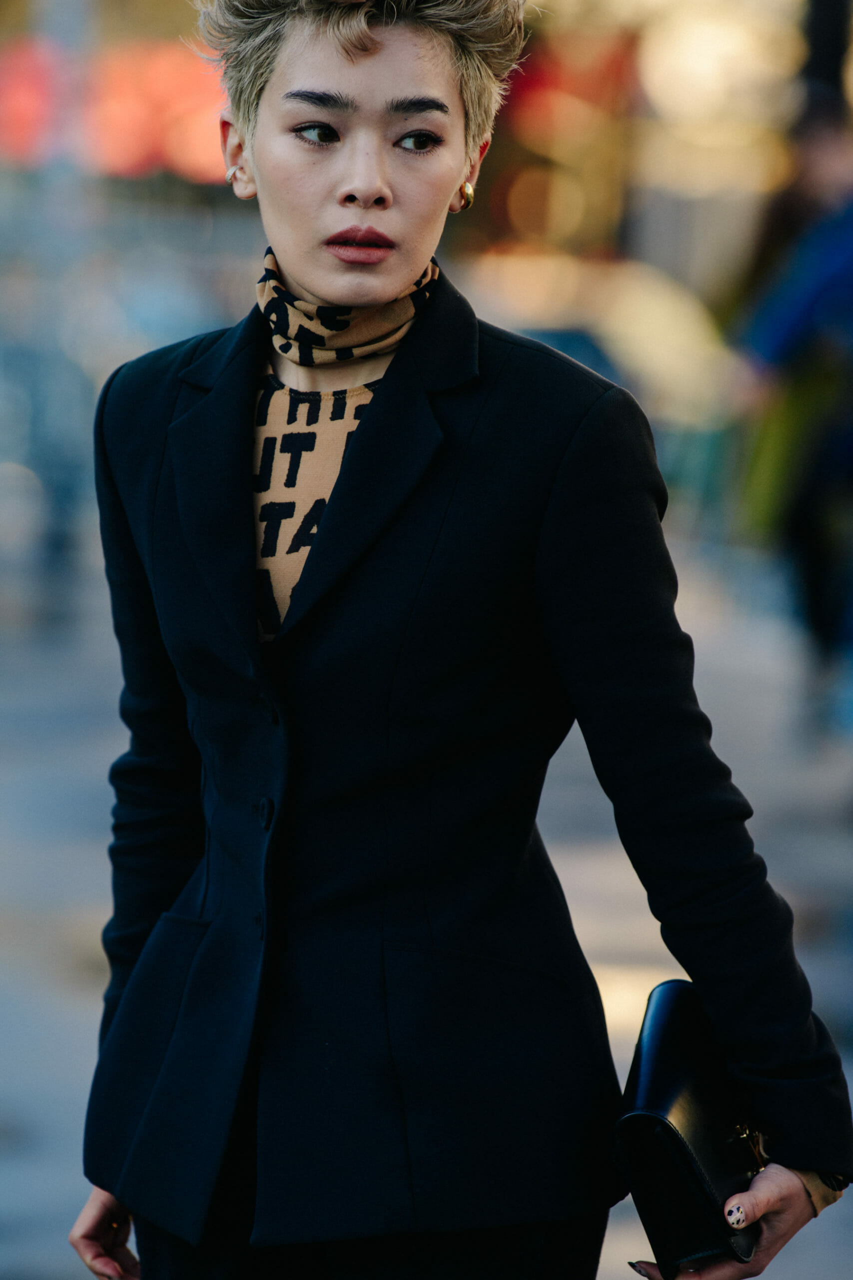 Woman with short gold hair