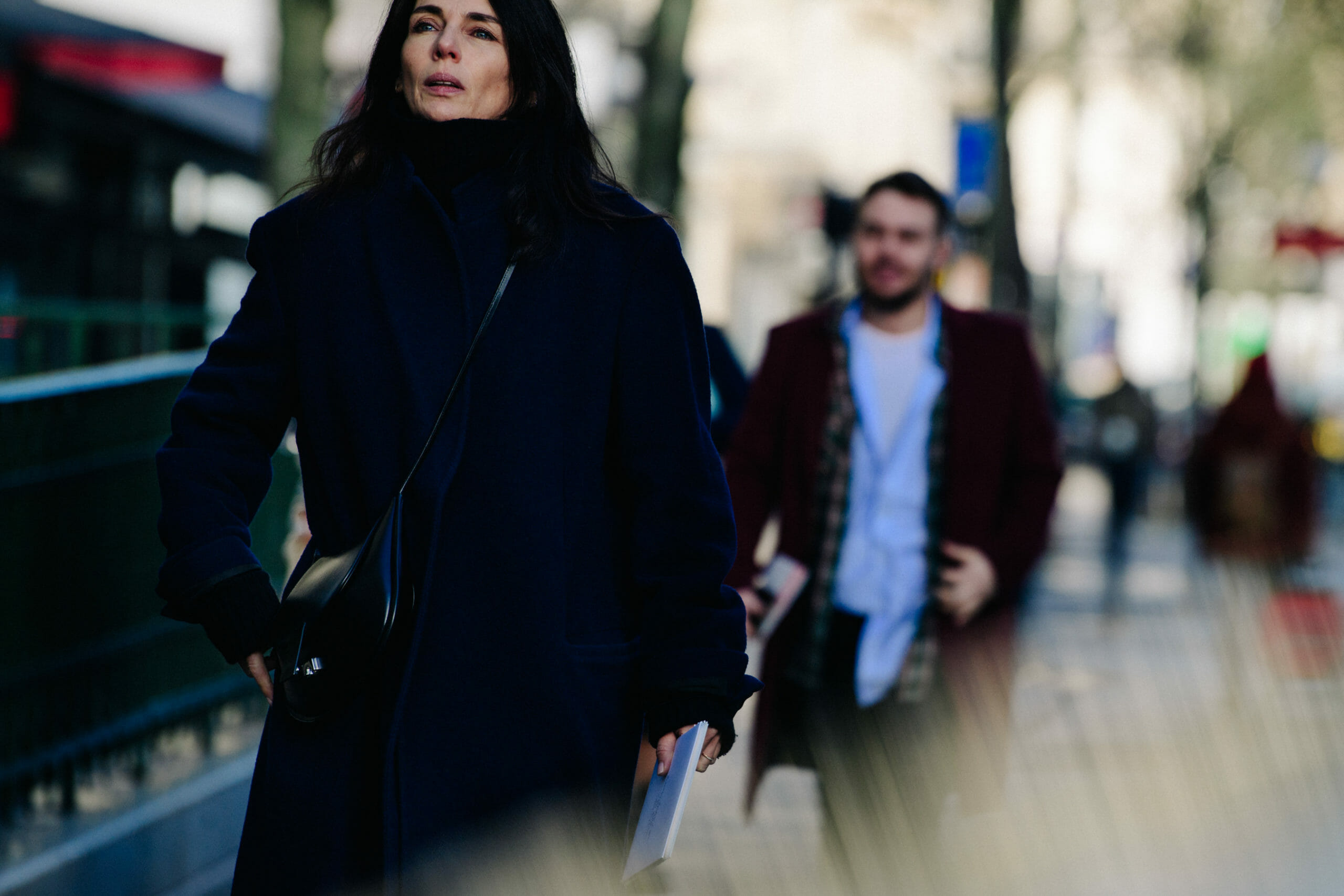 Woman wearing black coat