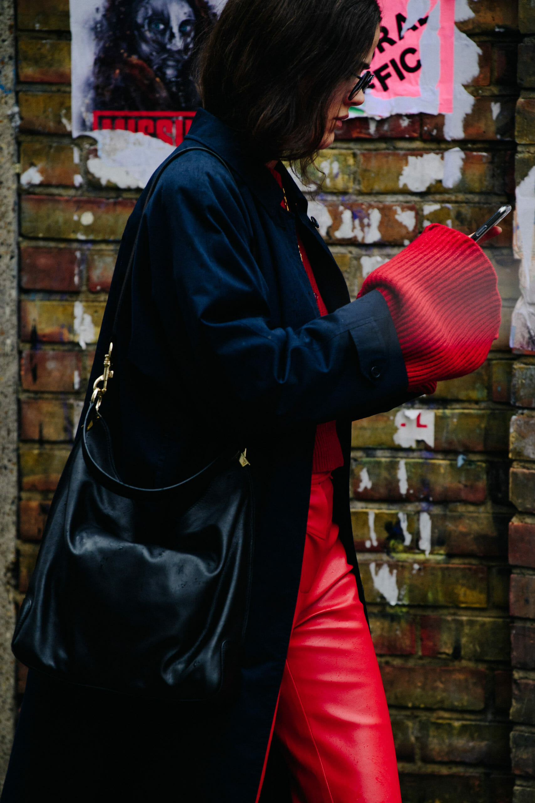 Woman wearing red leather pants