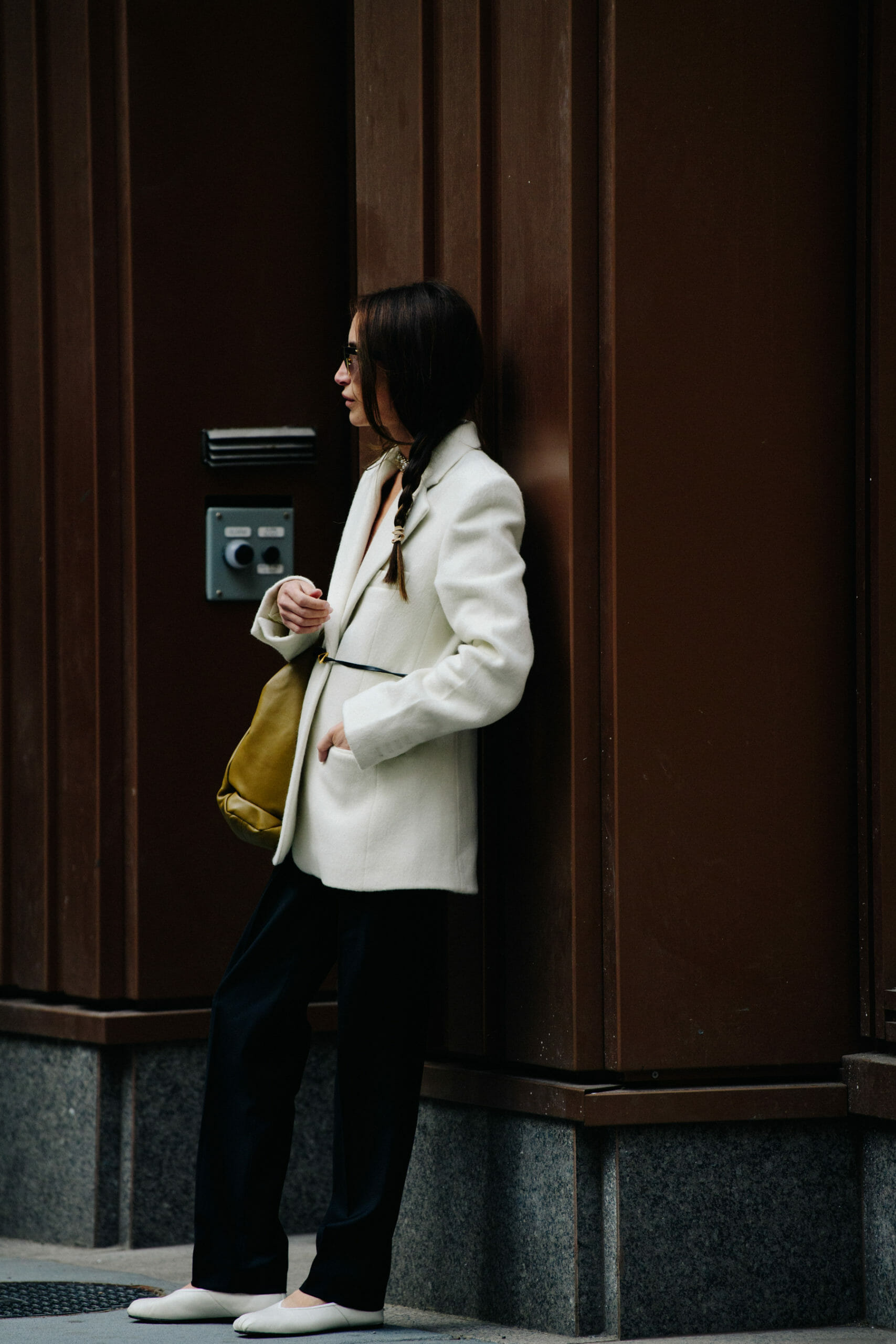 Woman wearing white jacket