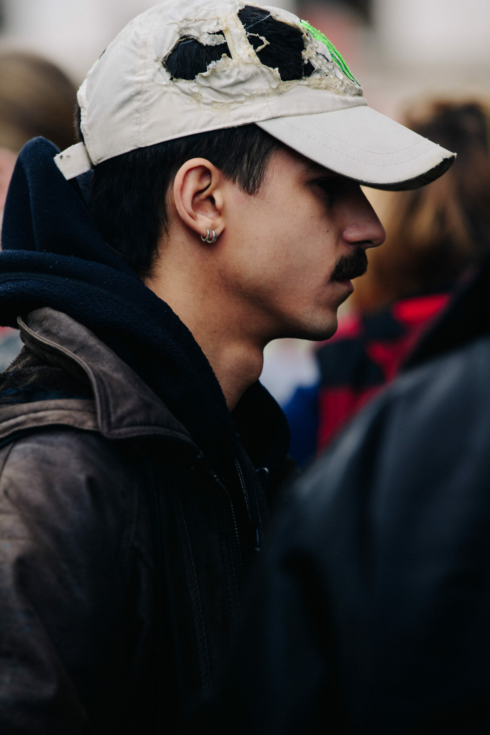 Man wearing Monster hat