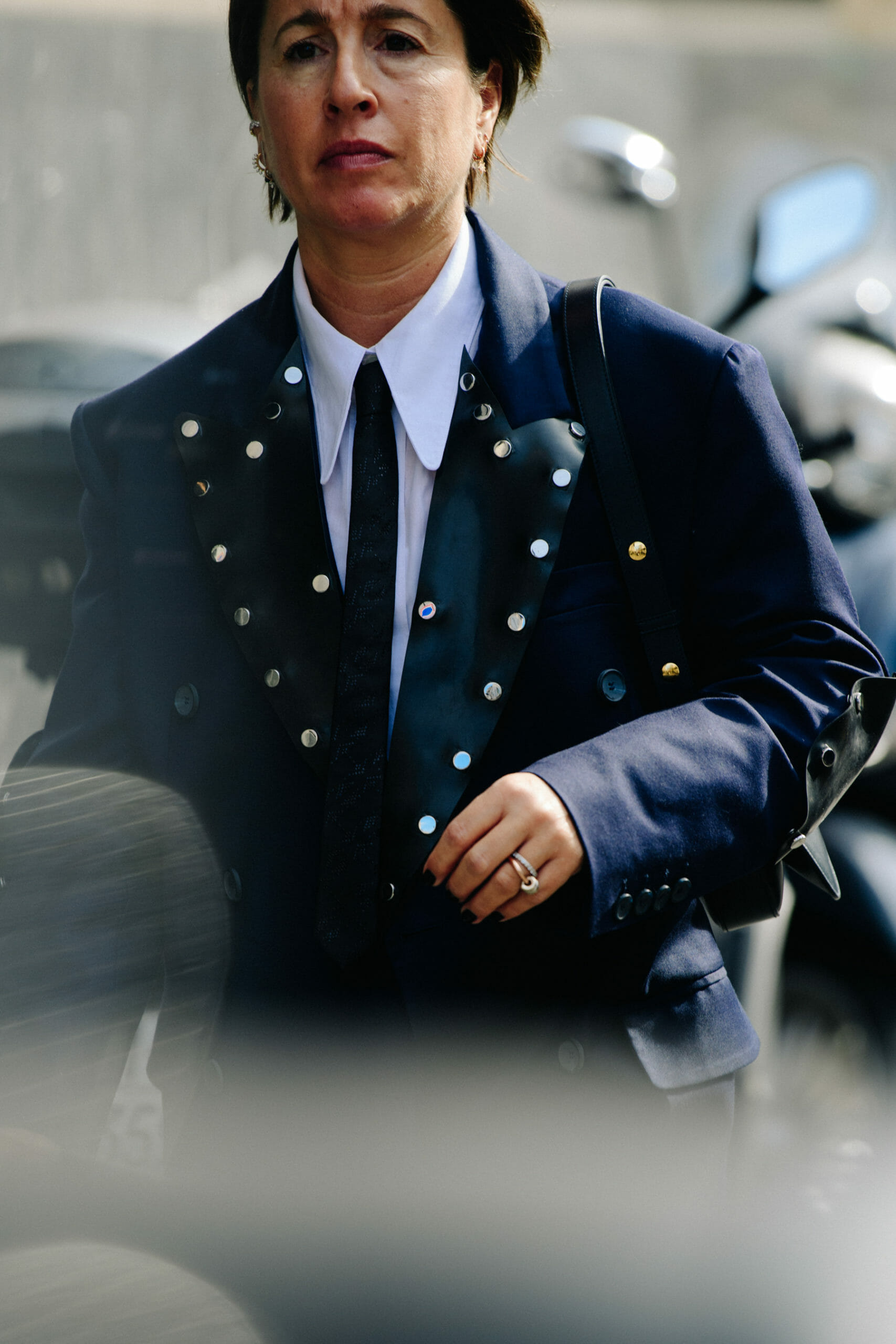Woman wearing studded jacket