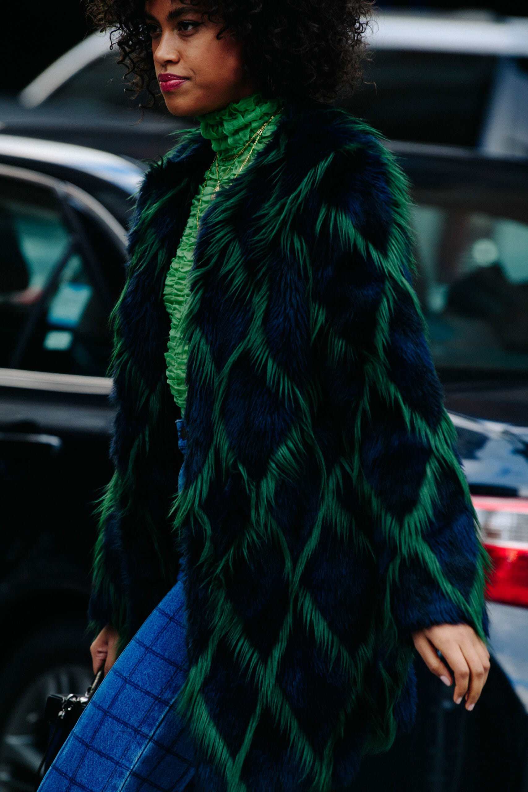 Woman wearing green fur