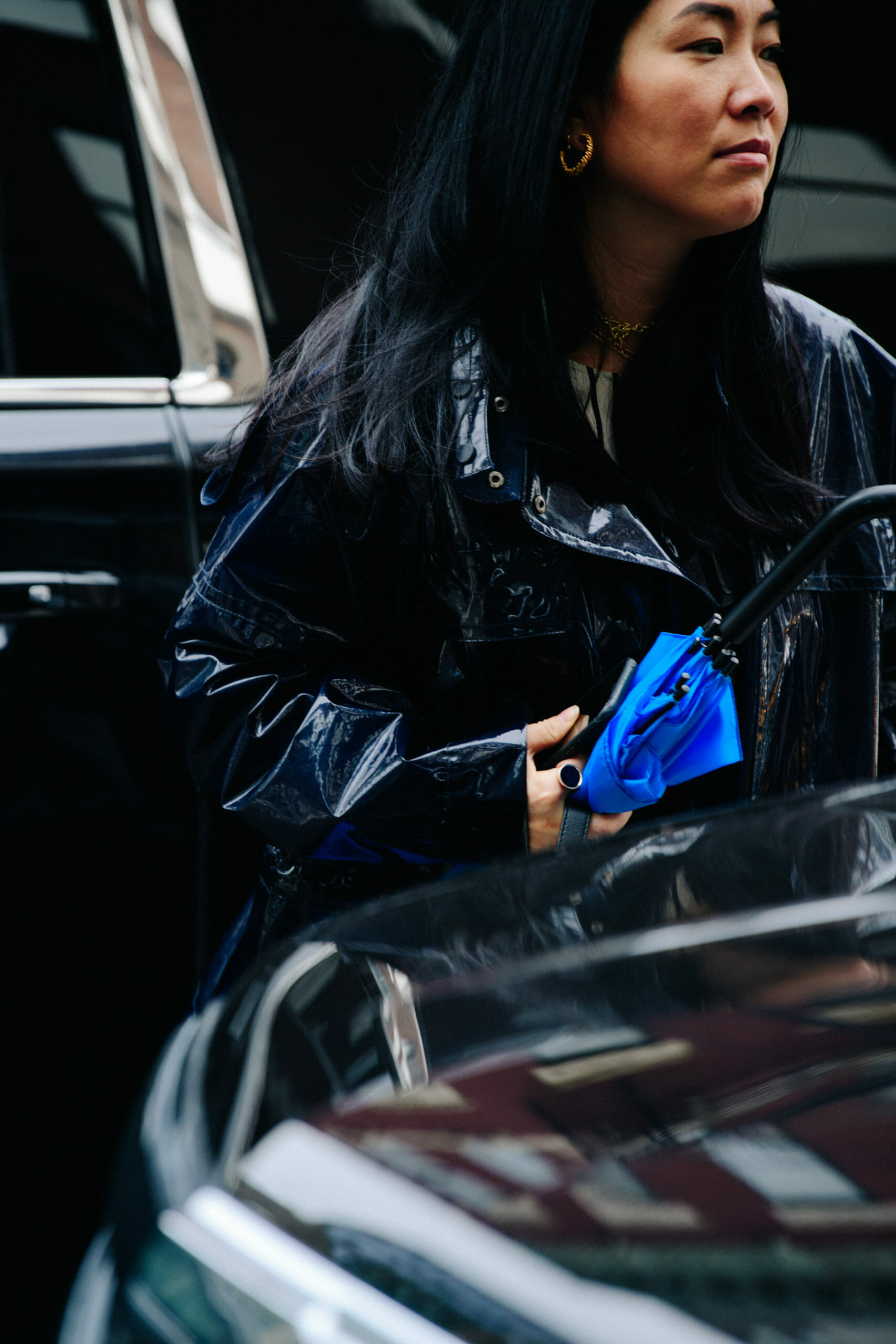 Woman wearing plastic jacket