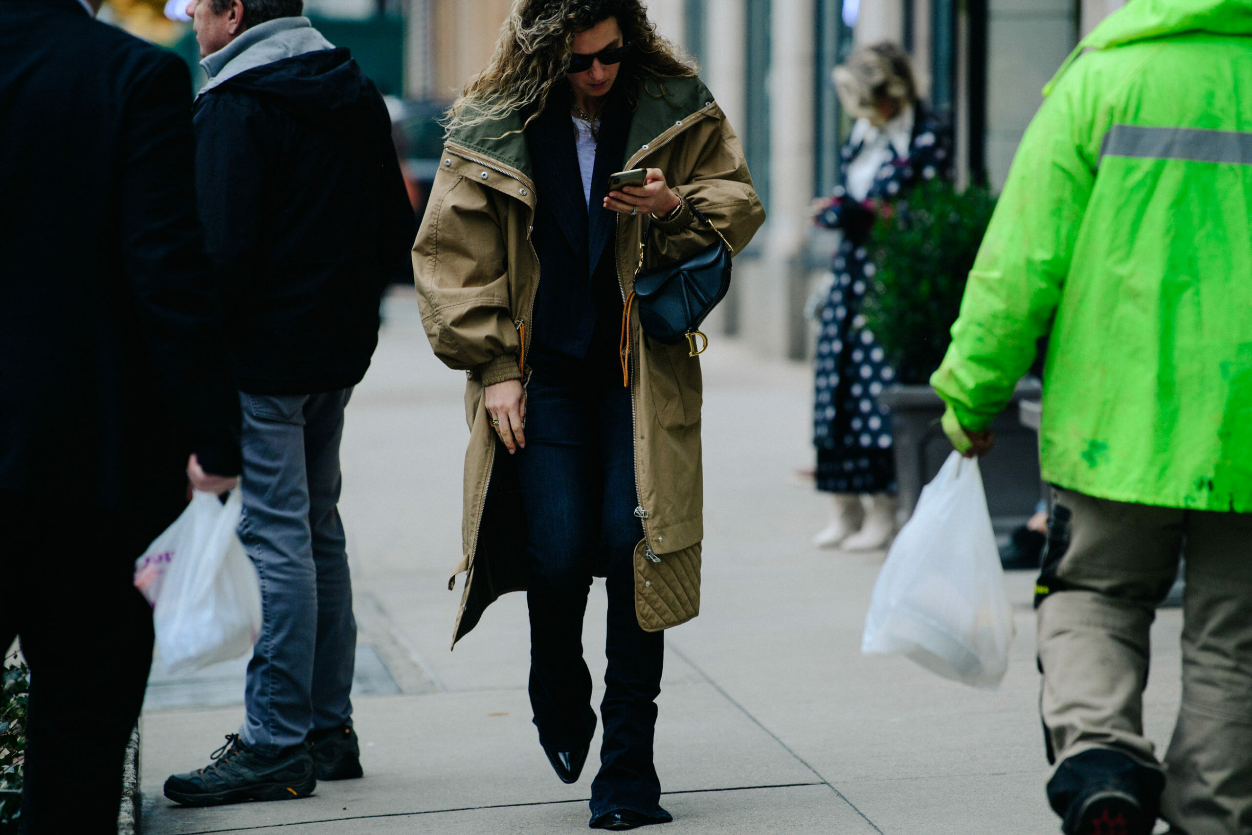 Woman carrying Christian Dior bag