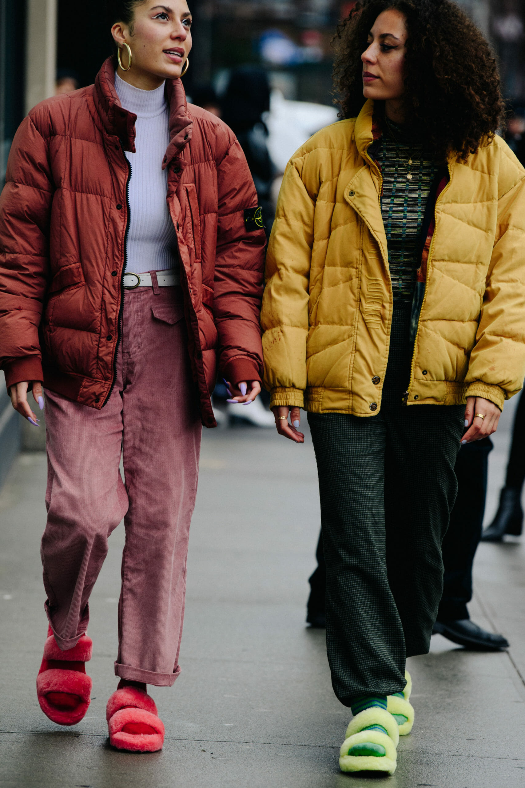 Women wearing UGG slippers