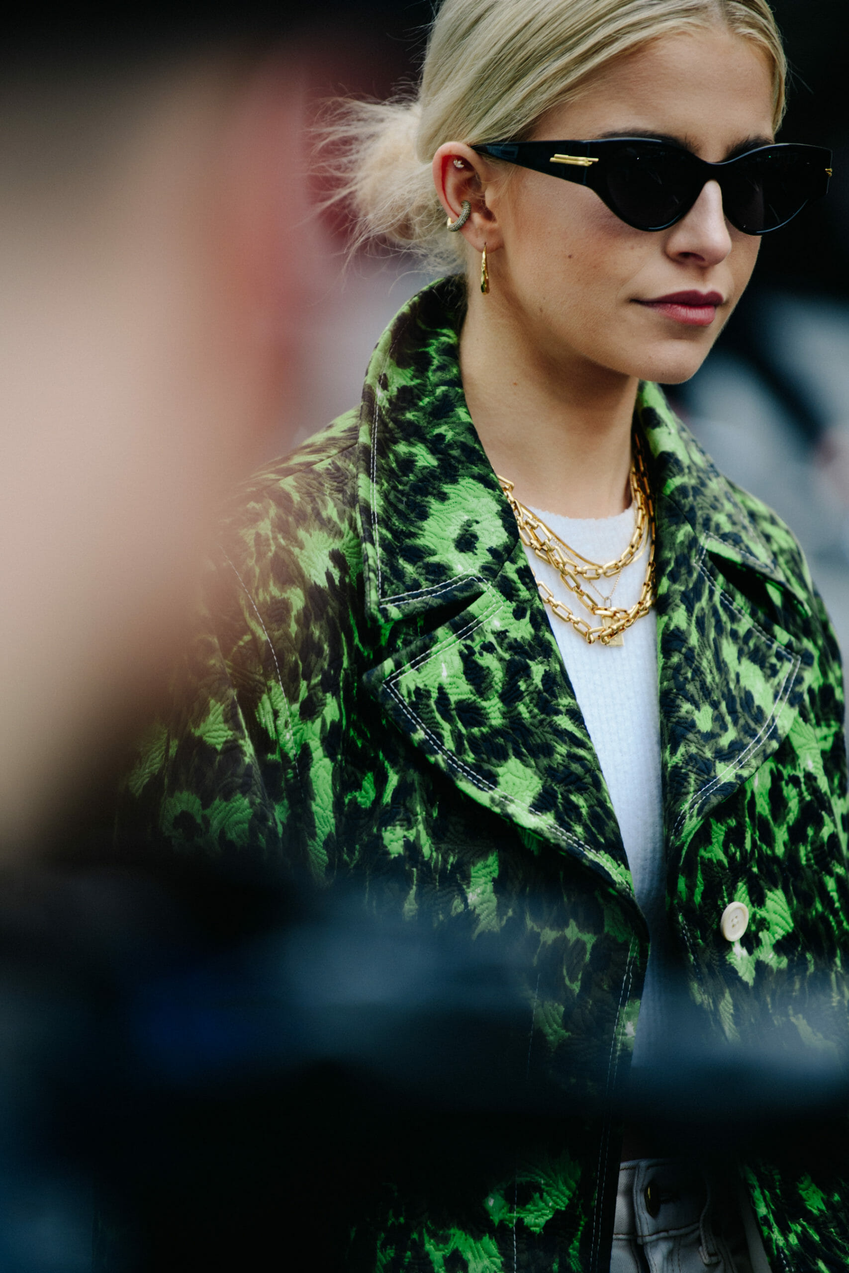 Woman wearing green jacket