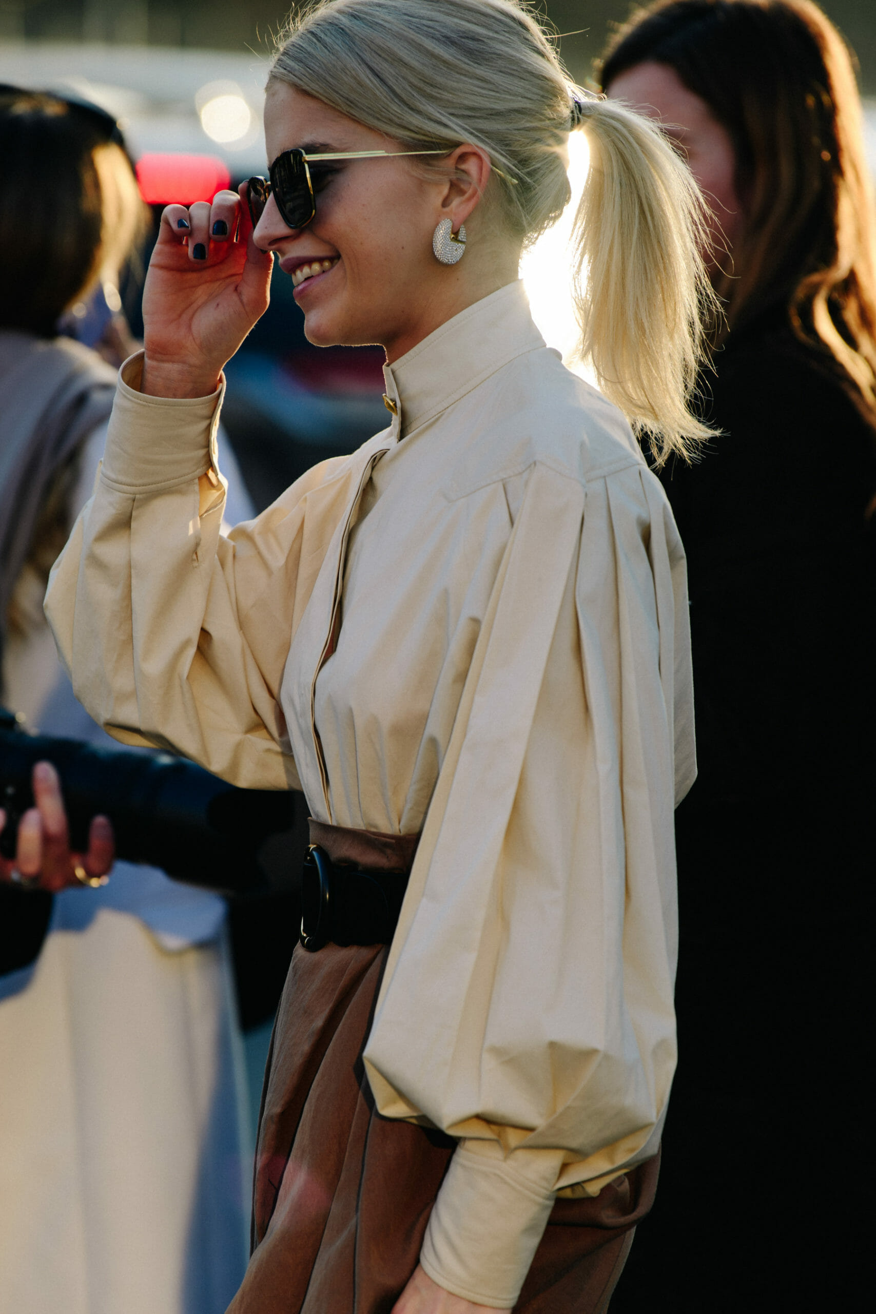 German blogger wearing cream shirt