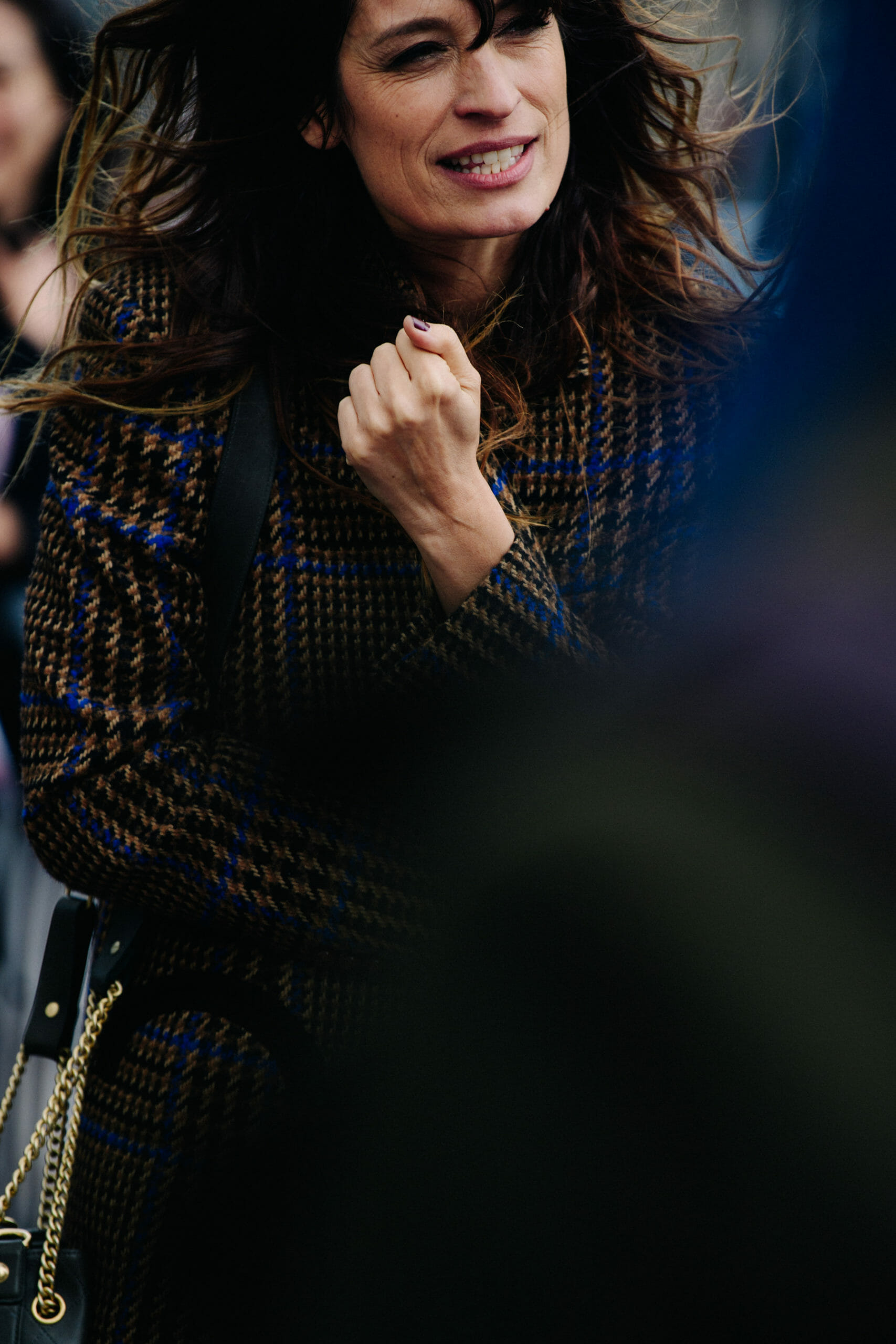 Woman weaing check wool coat