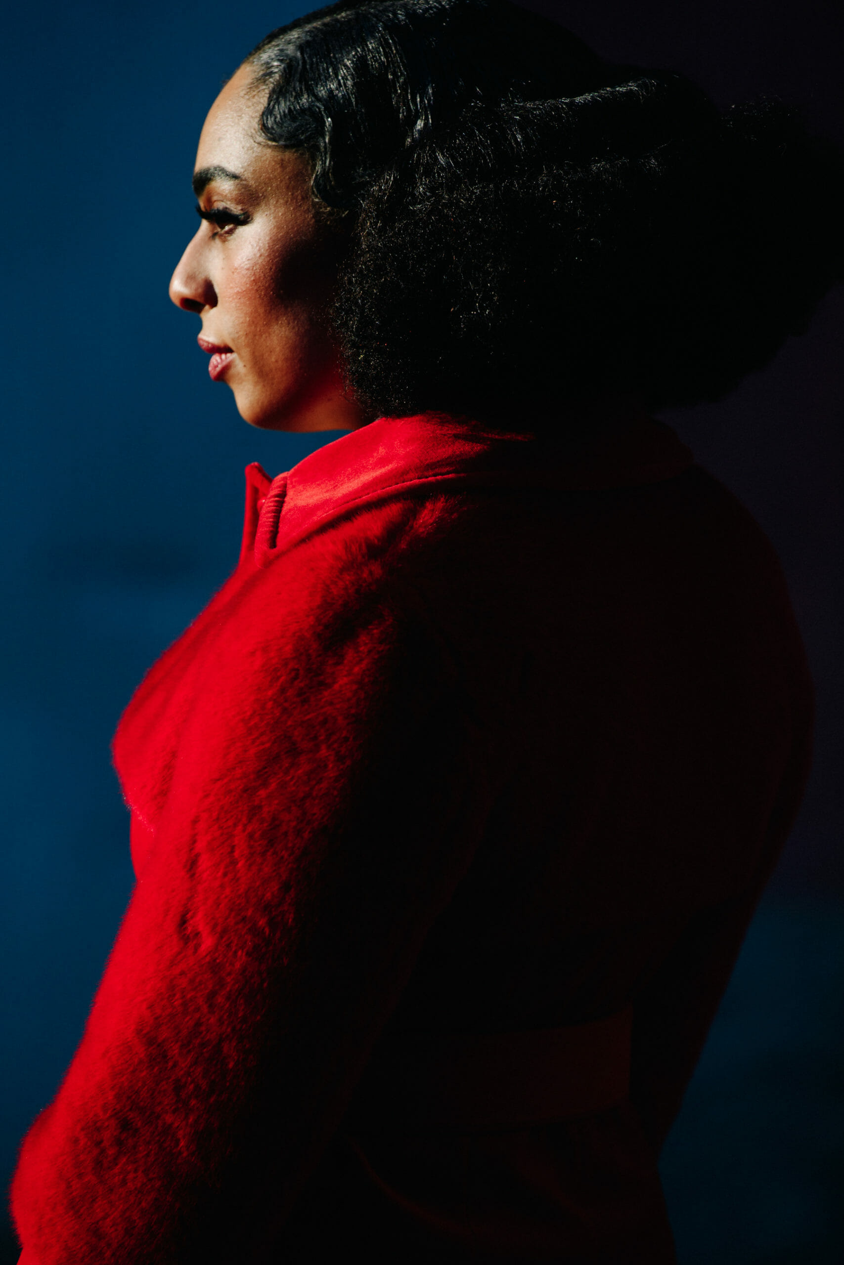 Woman wearing red fur coat