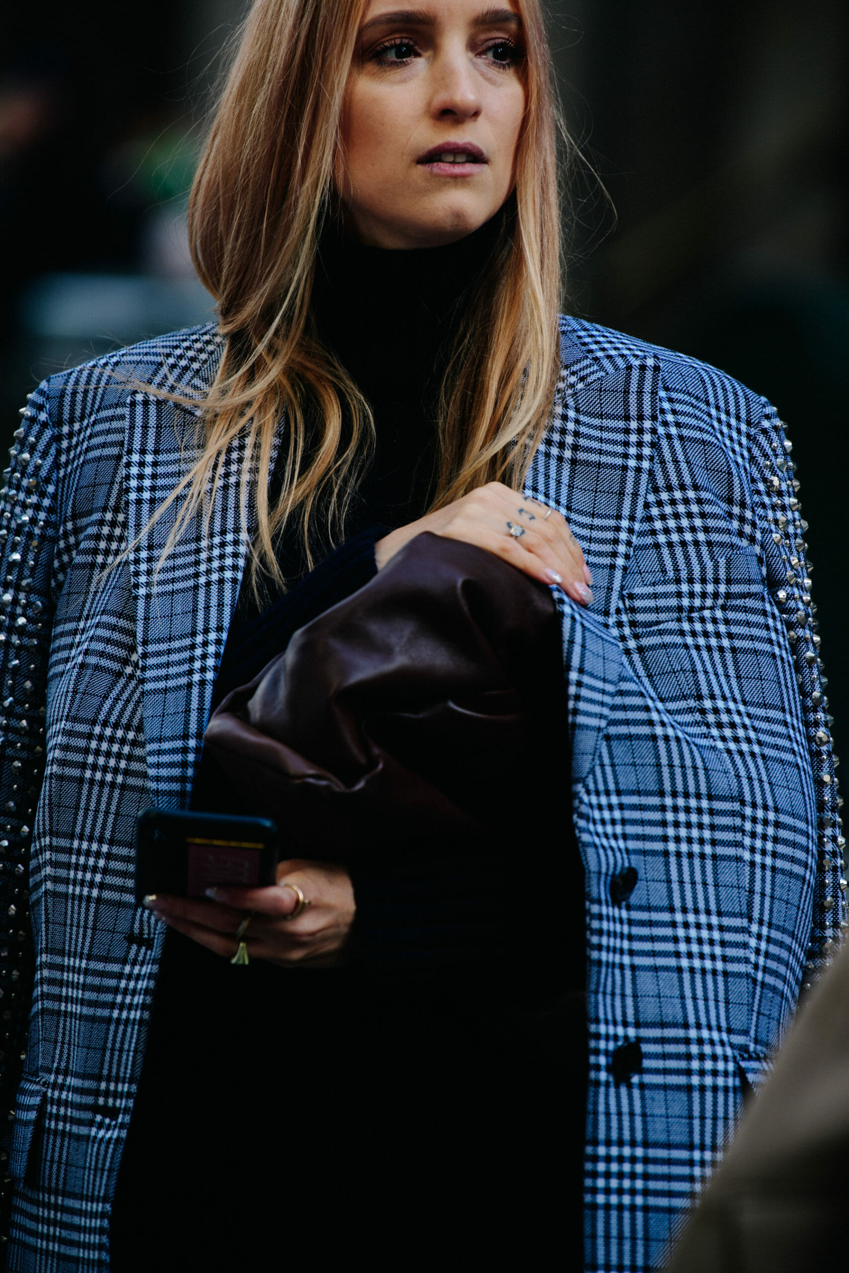 Woman wearing check jacket