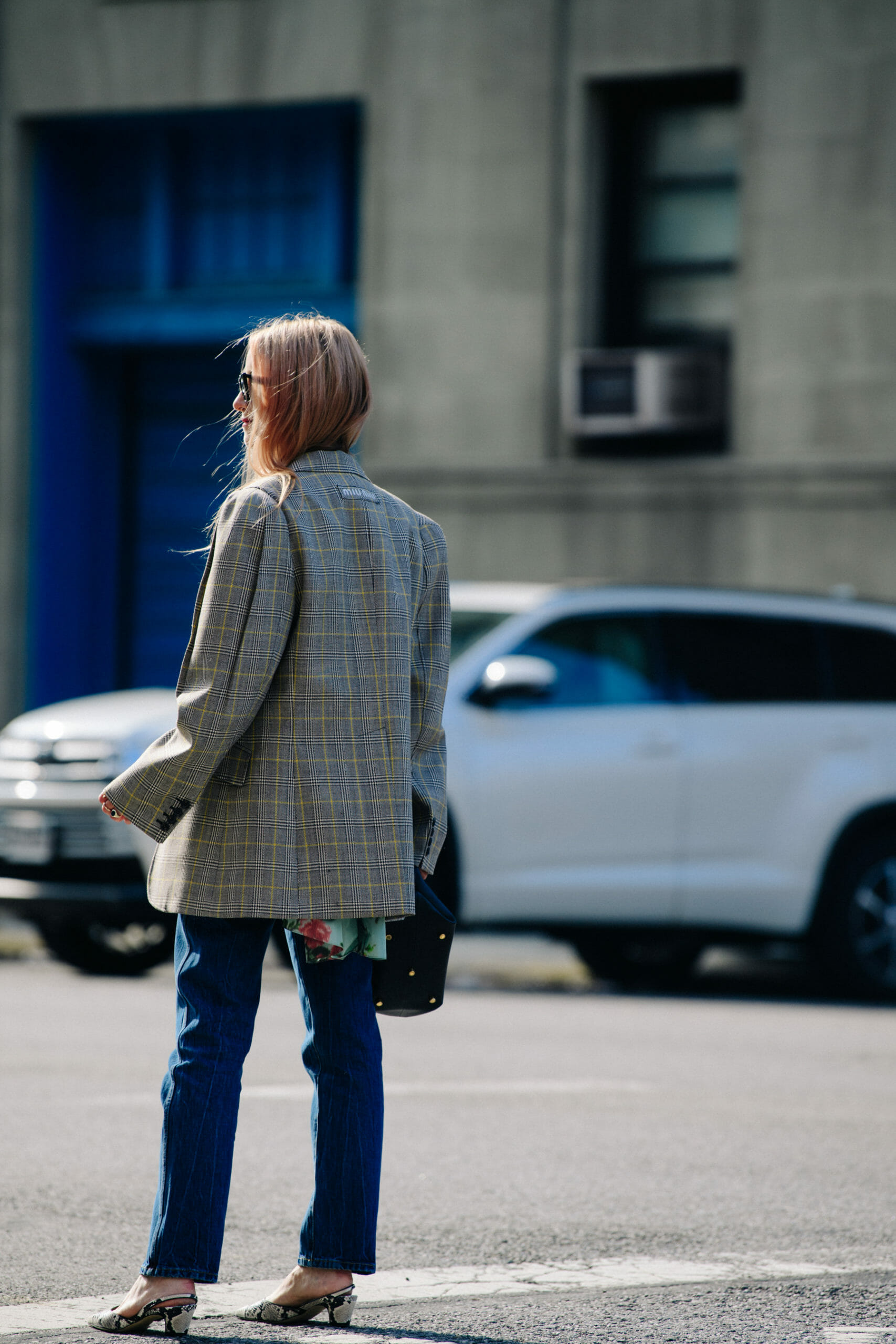 Woman wearing Miu Miu jacket