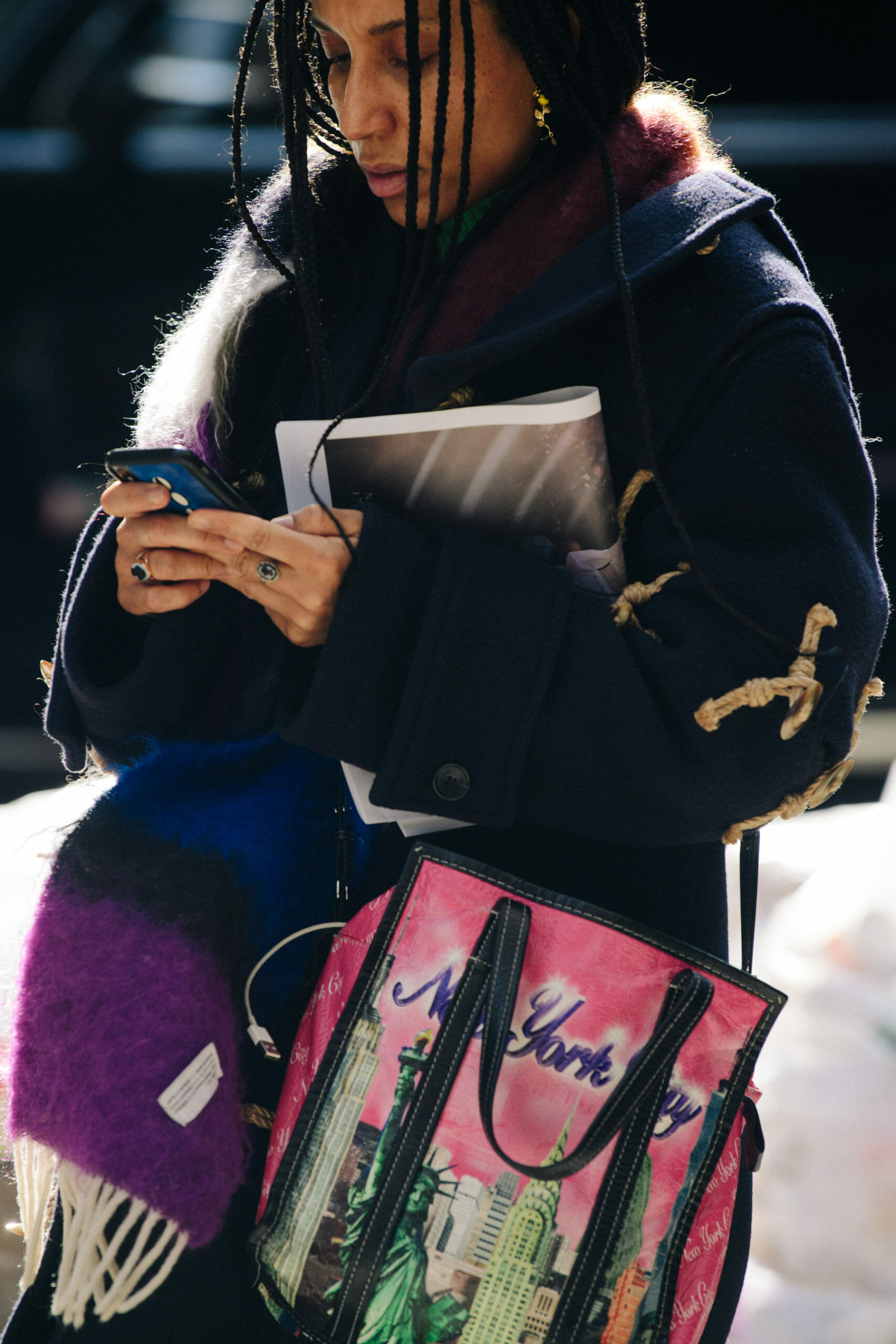 Woman carrying pink bag