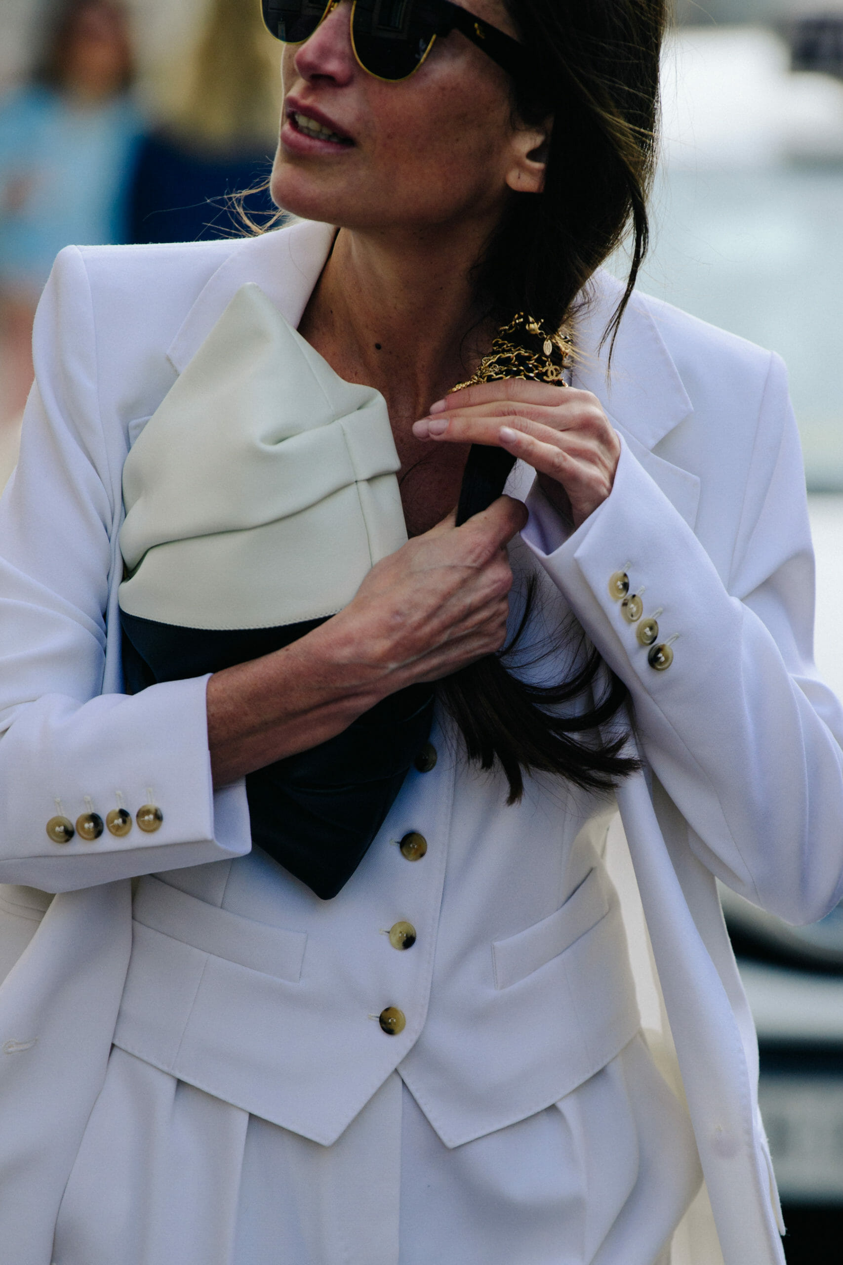 Woman wearing white suit