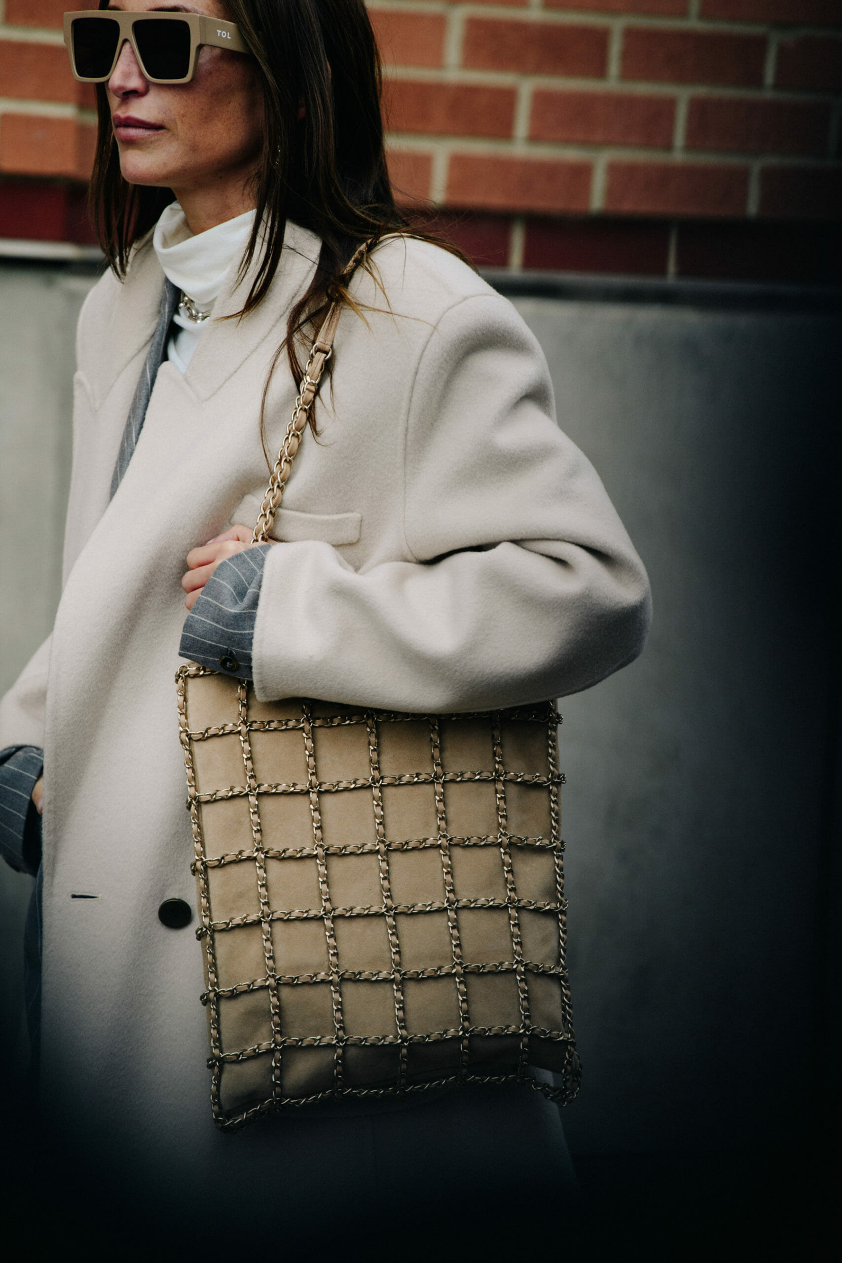 Woman wearing white coat